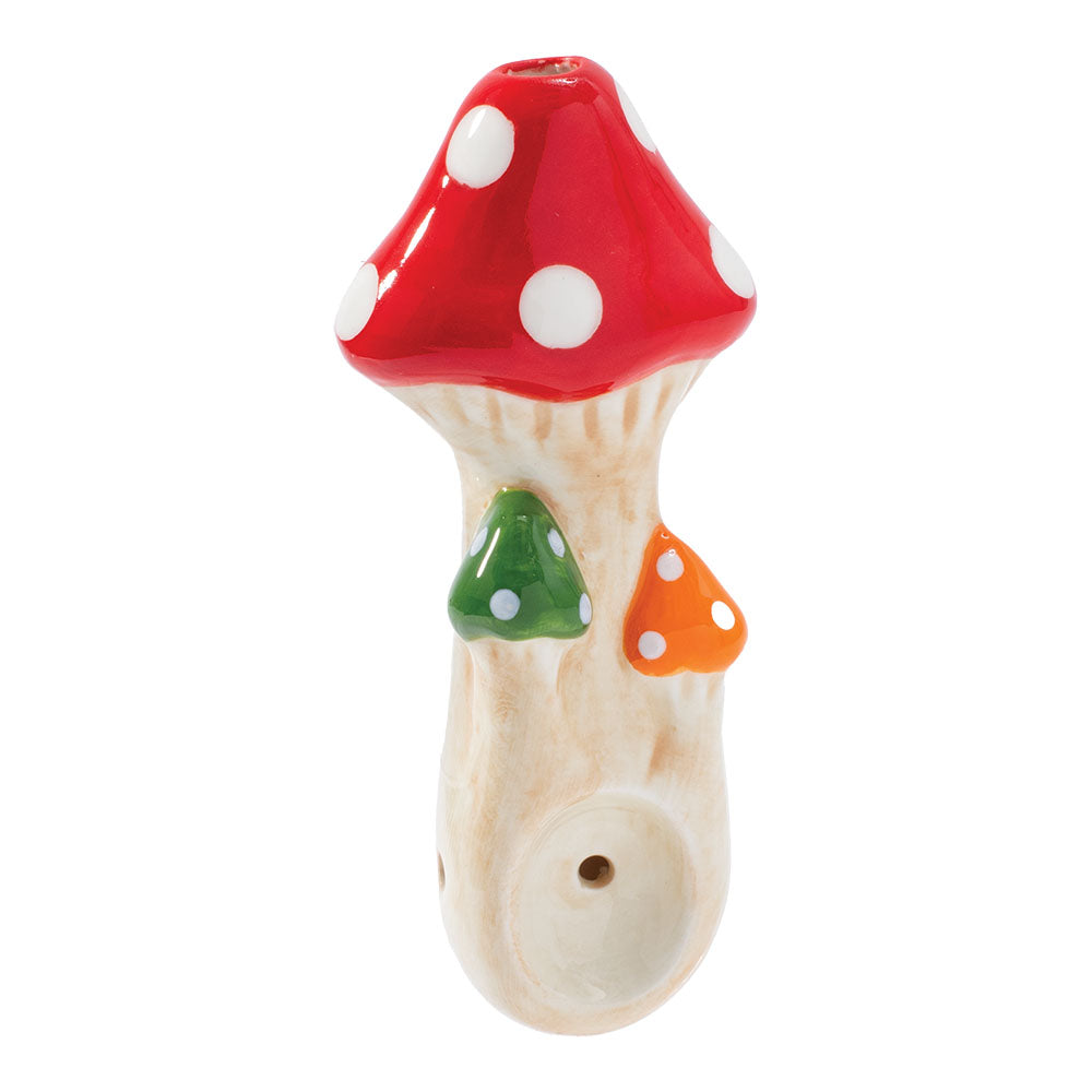 A front view of the Tri Mushroom Ceramic Pipe, featuring a red and white mushroom-shaped design made of ceramic. A front view of the Tri Mushroom Ceramic Pipe, featuring a red and white mushroom-shaped design made of ceramic.