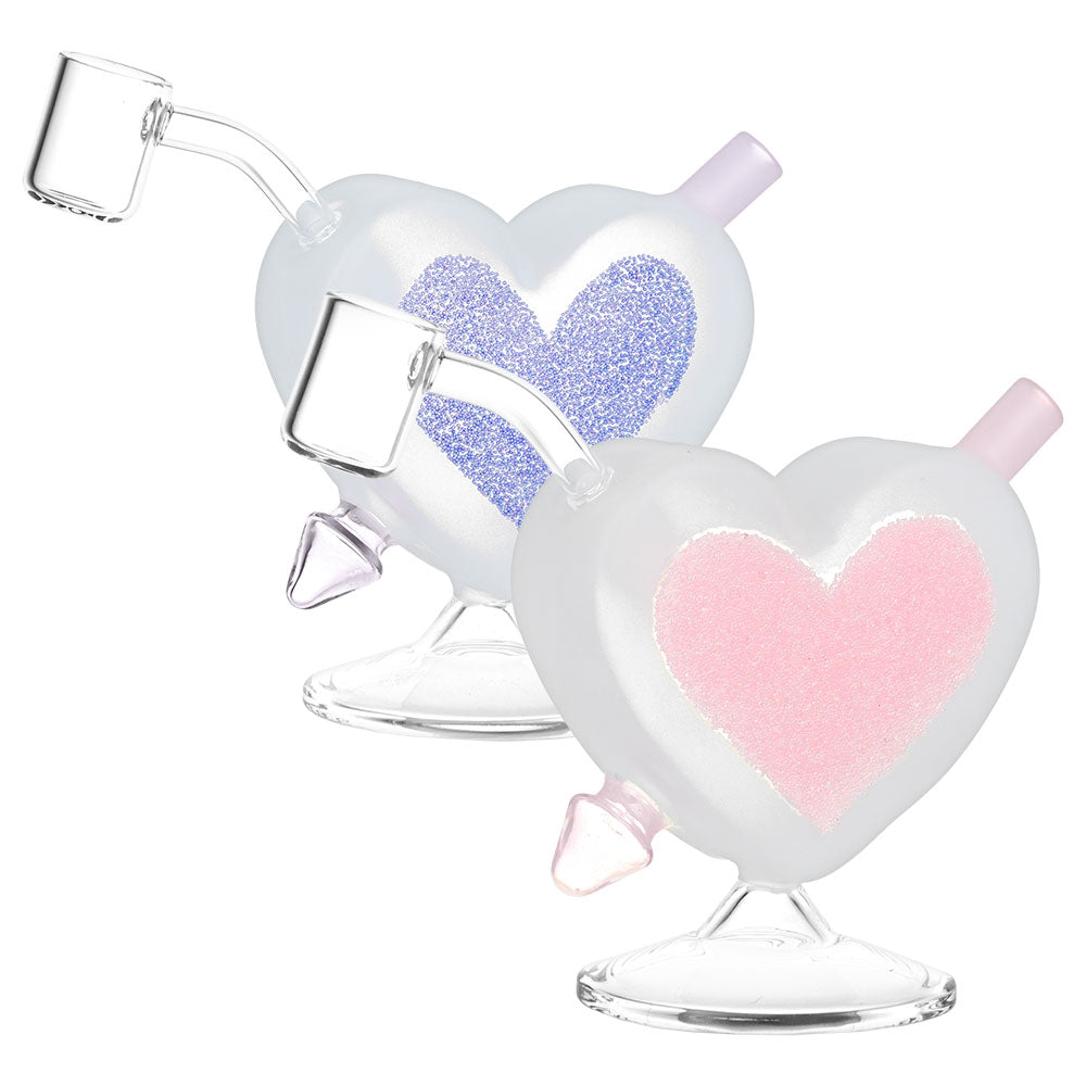 Front view of the Heart Sparkles Glass Mini Rig, showcasing the clear glass and its playful, heart-shaped design. Front view of the Heart Sparkles Glass Mini Rig, showcasing the clear glass and its playful, heart-shaped design.