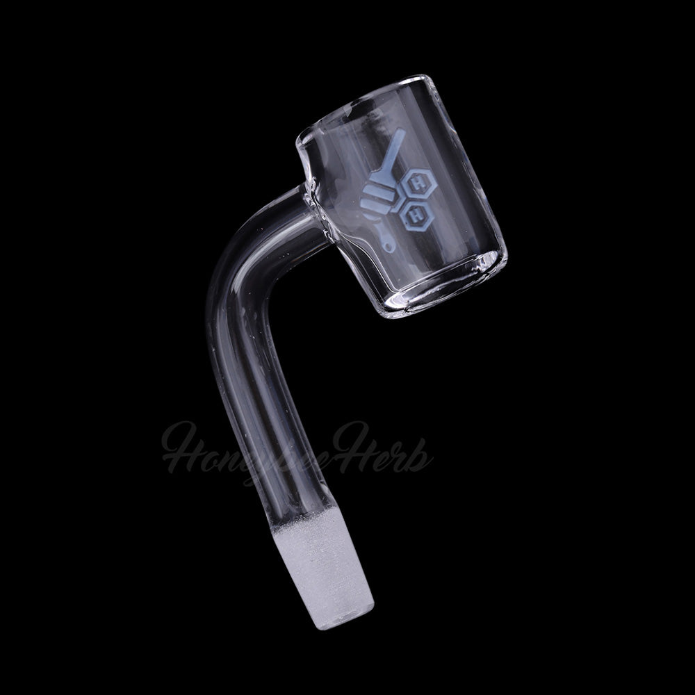 A close-up, angled view of the Thick Original Quartz Banger with a yellow line, showcasing its clear quartz construction. A close-up, angled view of the Thick Original Quartz Banger with a yellow line, showcasing its clear quartz construction.