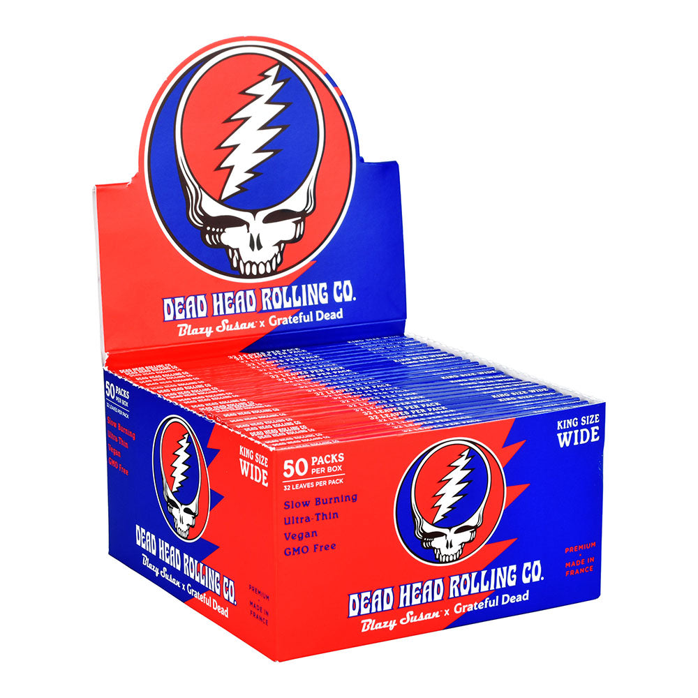 Front view of Grateful Dead Rolling Papers packaging, displaying bold lettering and the iconic skull logo on a colorful background. Front view of Grateful Dead Rolling Papers packaging, displaying bold lettering and the iconic skull logo on a colorful background.
