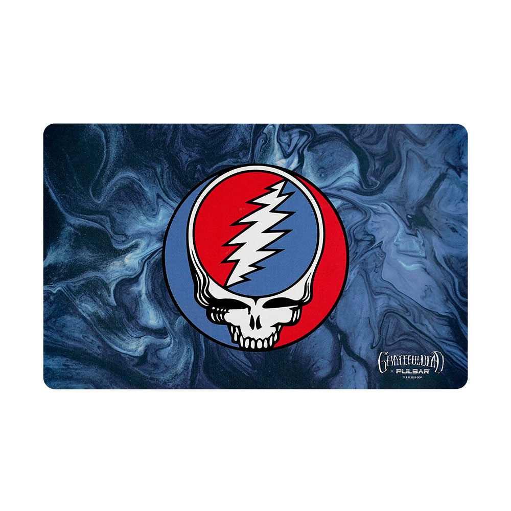 The DabPadz - Steal Your Face Swirls Dab Mat displays a swirling, colorful graphic of the iconic Grateful Dead "Steal Your Face" skull. The DabPadz - Steal Your Face Swirls Dab Mat displays a swirling, colorful graphic of the iconic Grateful Dead "Steal Your Face" skull.