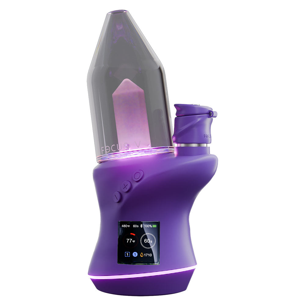Front view of the CARTA 2 Portable Dab Rig with a purple finish, displaying digital controls on its side. Front view of the CARTA 2 Portable Dab Rig with a purple finish, displaying digital controls on its side.
