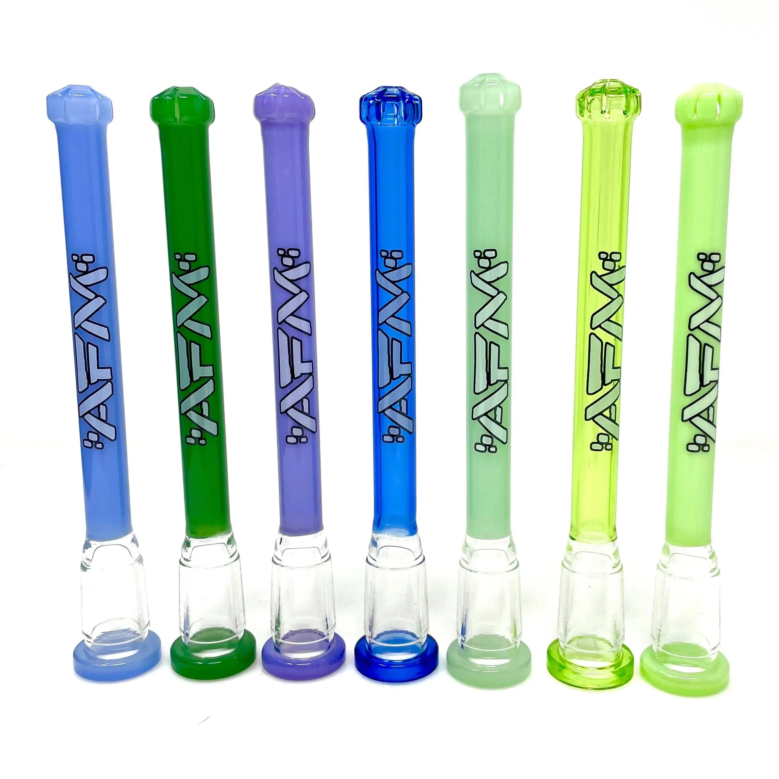 A side view of several AFM Showerhead Downstems in clear glass, arranged against a neutral gray background. A side view of several AFM Showerhead Downstems in clear glass, arranged against a neutral gray background.