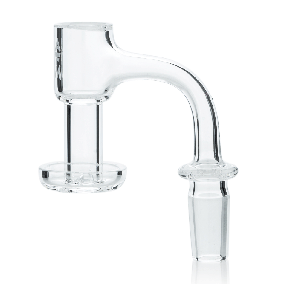 A slightly angled view of the Mini Terp Slurper 20mm, showcasing its clear glass construction and unique bowl design. A slightly angled view of the Mini Terp Slurper 20mm, showcasing its clear glass construction and unique bowl design.