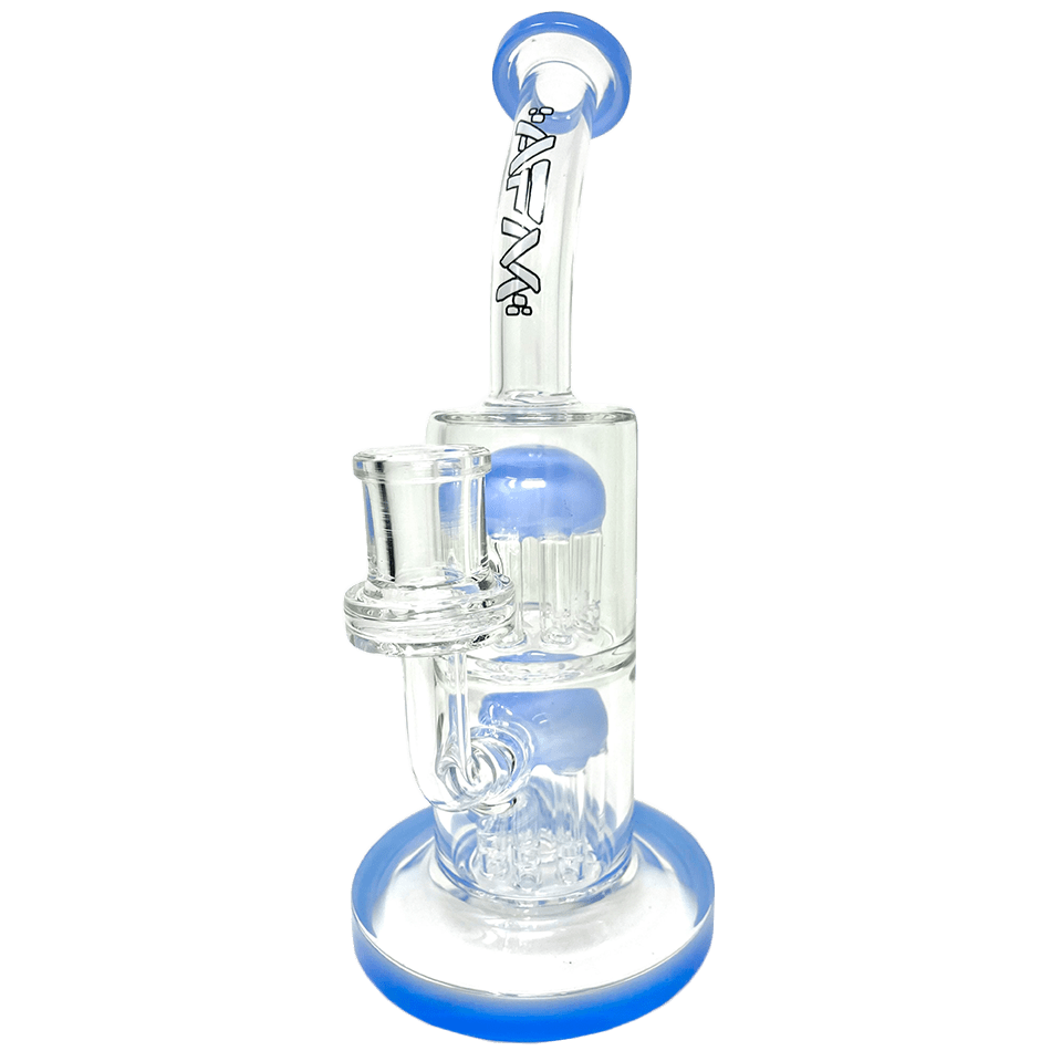A studio shot of the 9-inch The Double Charge Rig, showcasing its clear glass construction and compact design. A studio shot of the 9-inch The Double Charge Rig, showcasing its clear glass construction and compact design.