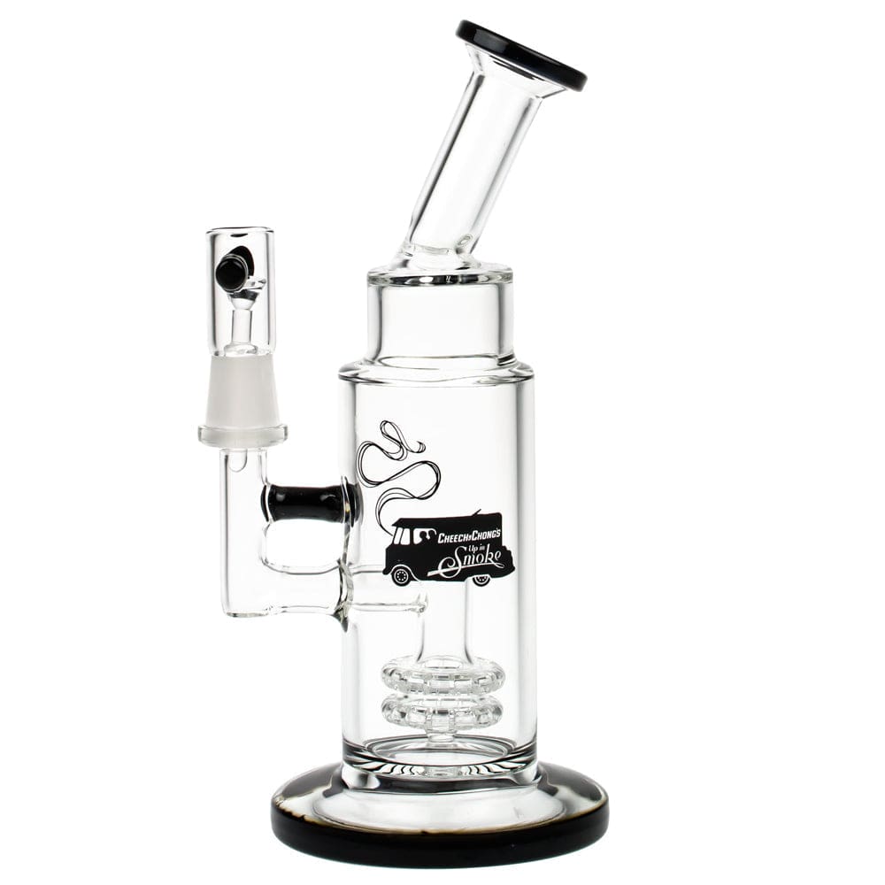 A studio shot of the Anthony 8" Dab Rig, showcasing the clear glass rig angled against a plain white background. A studio shot of the Anthony 8" Dab Rig, showcasing the clear glass rig angled against a plain white background.