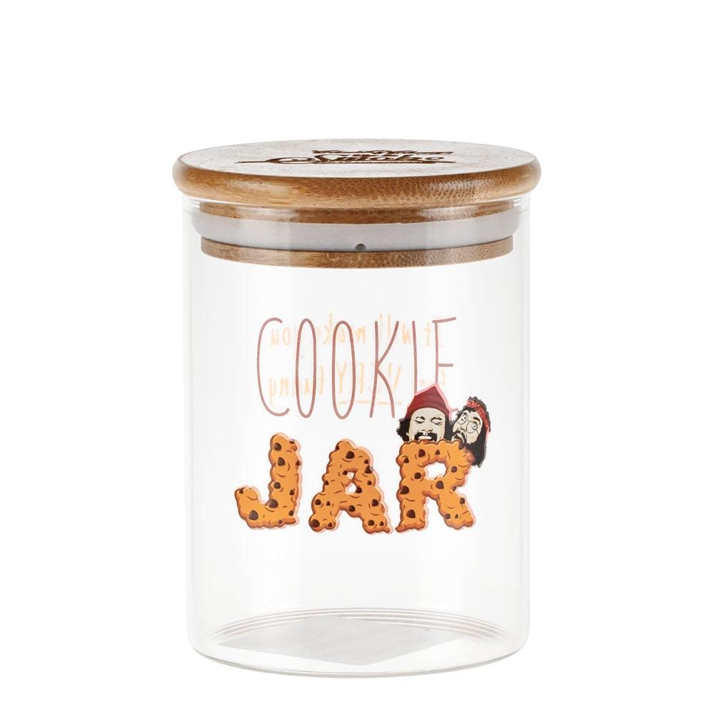 Front view of the Up In Smoke 40th Anniversary Cookie Stash Jar, a clear glass jar with a wooden lid. Front view of the Up In Smoke 40th Anniversary Cookie Stash Jar, a clear glass jar with a wooden lid.
