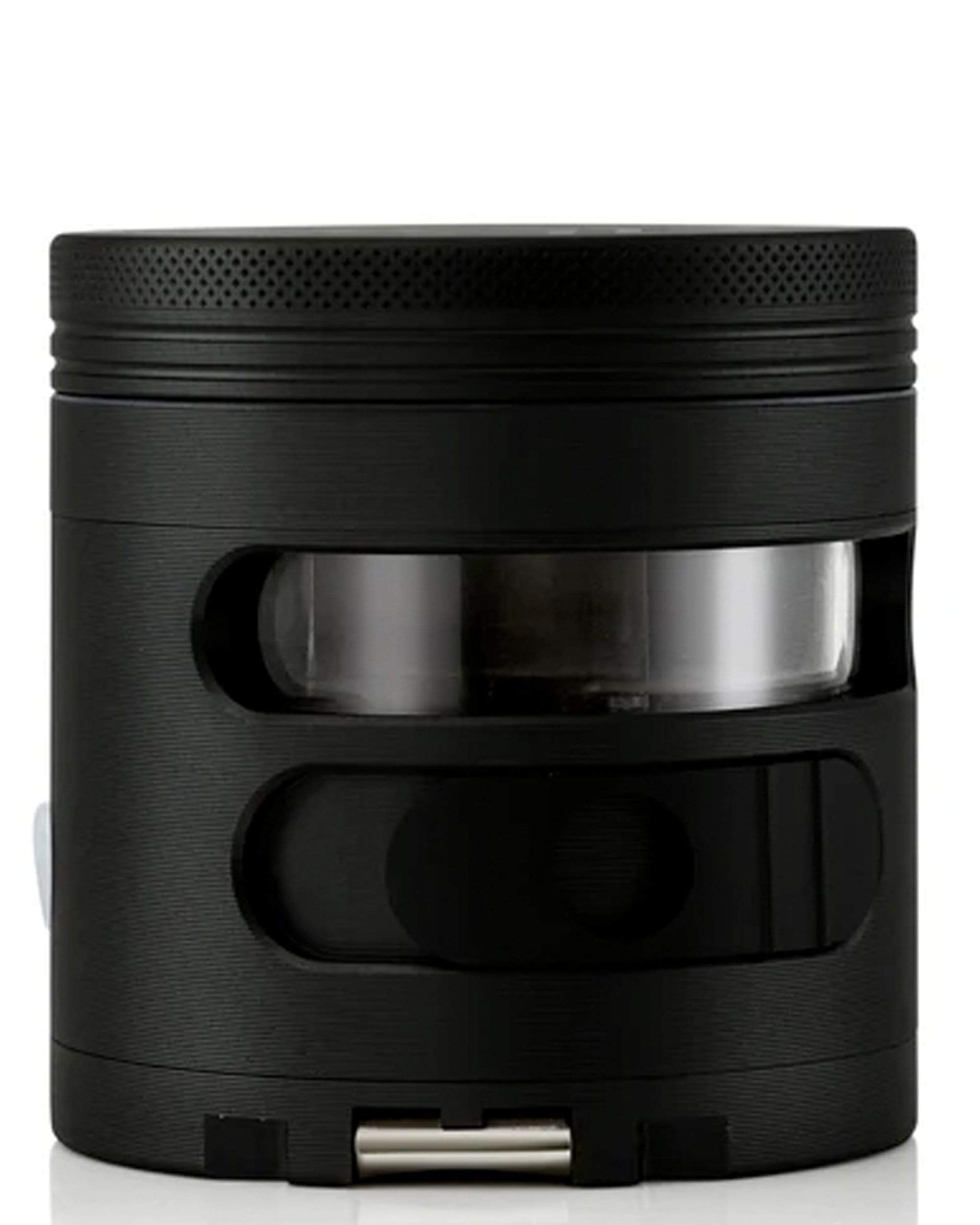 Front view of the Tectonic9 Auto Dispensing Grinder, a sleek, black cylindrical device with a modern, minimalist design. Front view of the Tectonic9 Auto Dispensing Grinder, a sleek, black cylindrical device with a modern, minimalist design.