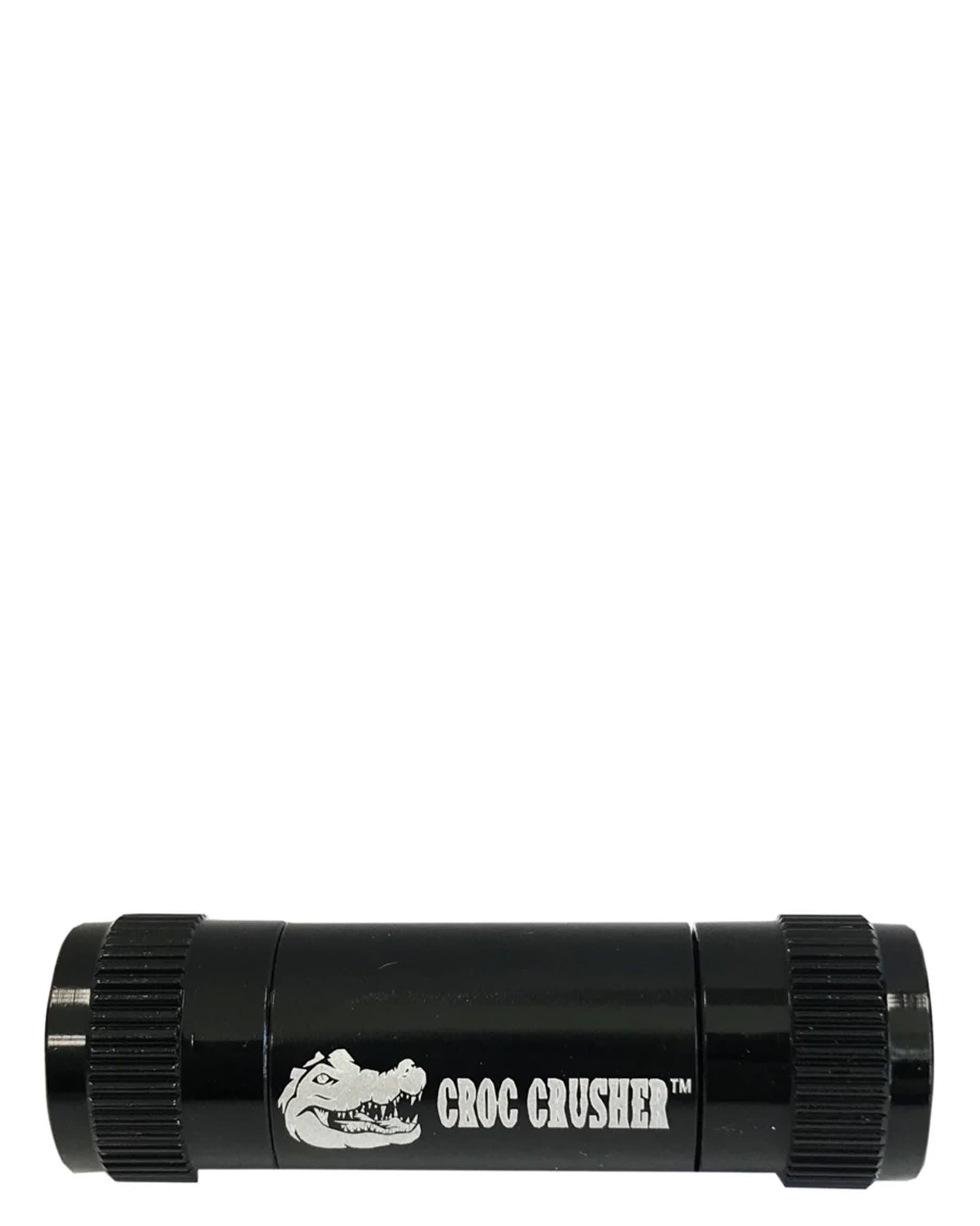 A close-up, angled view of the Pollen Press, displaying its metallic construction and textured grip. A close-up, angled view of the Pollen Press, displaying its metallic construction and textured grip.