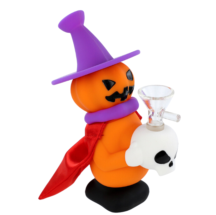 A three-quarter view of the Silicone Jack O'Lantern Witch Mini Bong, showcasing its orange pumpkin shape and witch hat. A three-quarter view of the Silicone Jack O'Lantern Witch Mini Bong, showcasing its orange pumpkin shape and witch hat.