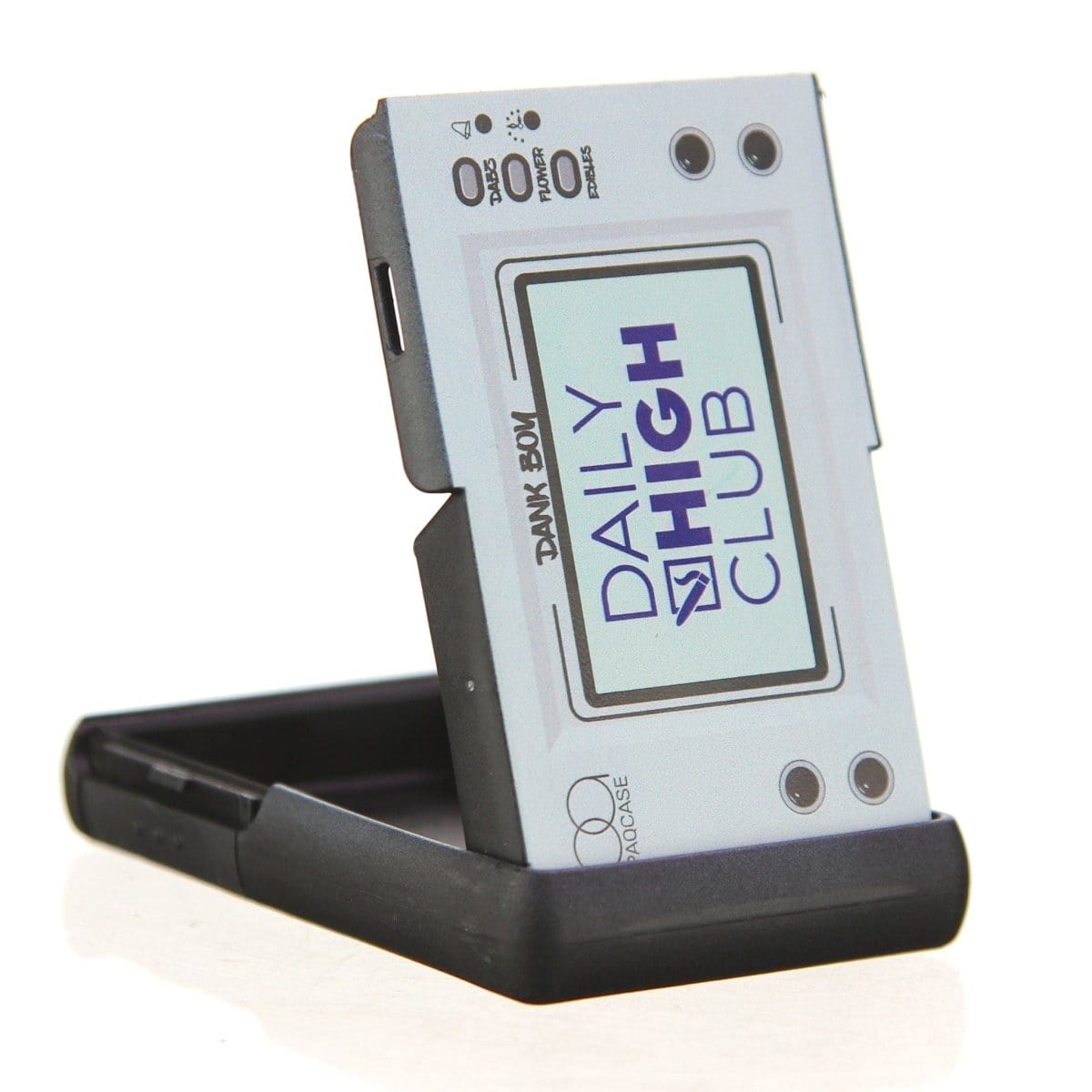 Front view of the Dank Boy PAQ Case, a black rectangular container with a white logo, angled slightly on a dark surface. Front view of the Dank Boy PAQ Case, a black rectangular container with a white logo, angled slightly on a dark surface.