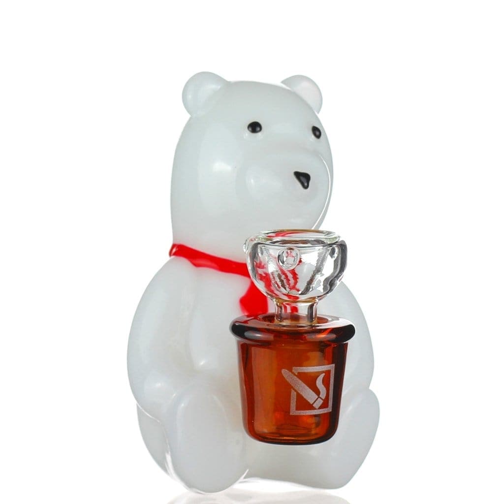 Front view of the Snowy Freed Bong, a white, sculpted glass piece resembling a bear, on a reflective surface. Front view of the Snowy Freed Bong, a white, sculpted glass piece resembling a bear, on a reflective surface.