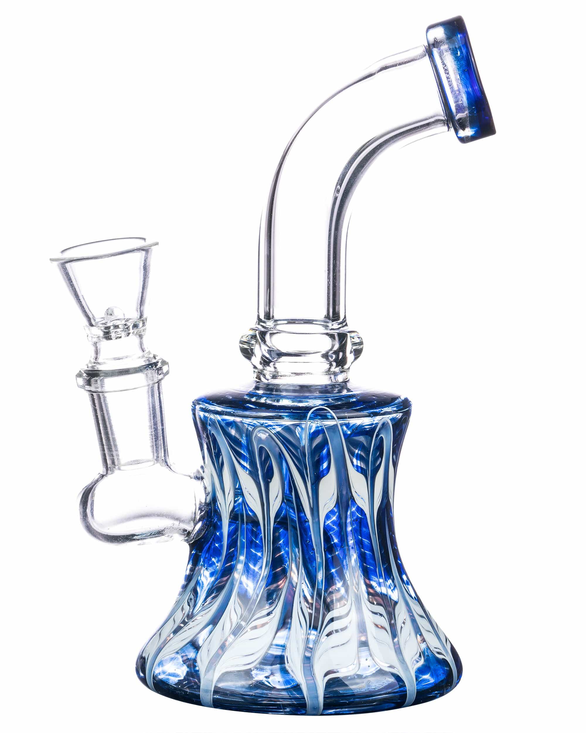 A front view of the 6" Raked Blue Mini Bong, showing the blue-tinted glass and simple, compact design. A front view of the 6" Raked Blue Mini Bong, showing the blue-tinted glass and simple, compact design.