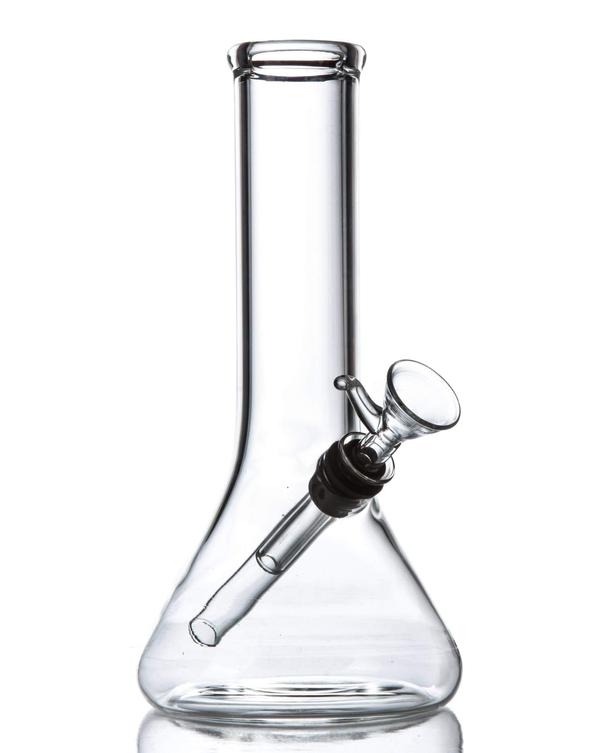 Front view of the Beaker Base Water Pipe, a clear glass piece with a simple, cylindrical base and angled neck. Front view of the Beaker Base Water Pipe, a clear glass piece with a simple, cylindrical base and angled neck.