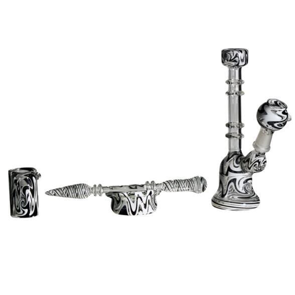 A side view of the Bell Dab Rig Bundle, showing the curved glass and joint detail against a plain white background. A side view of the Bell Dab Rig Bundle, showing the curved glass and joint detail against a plain white background.