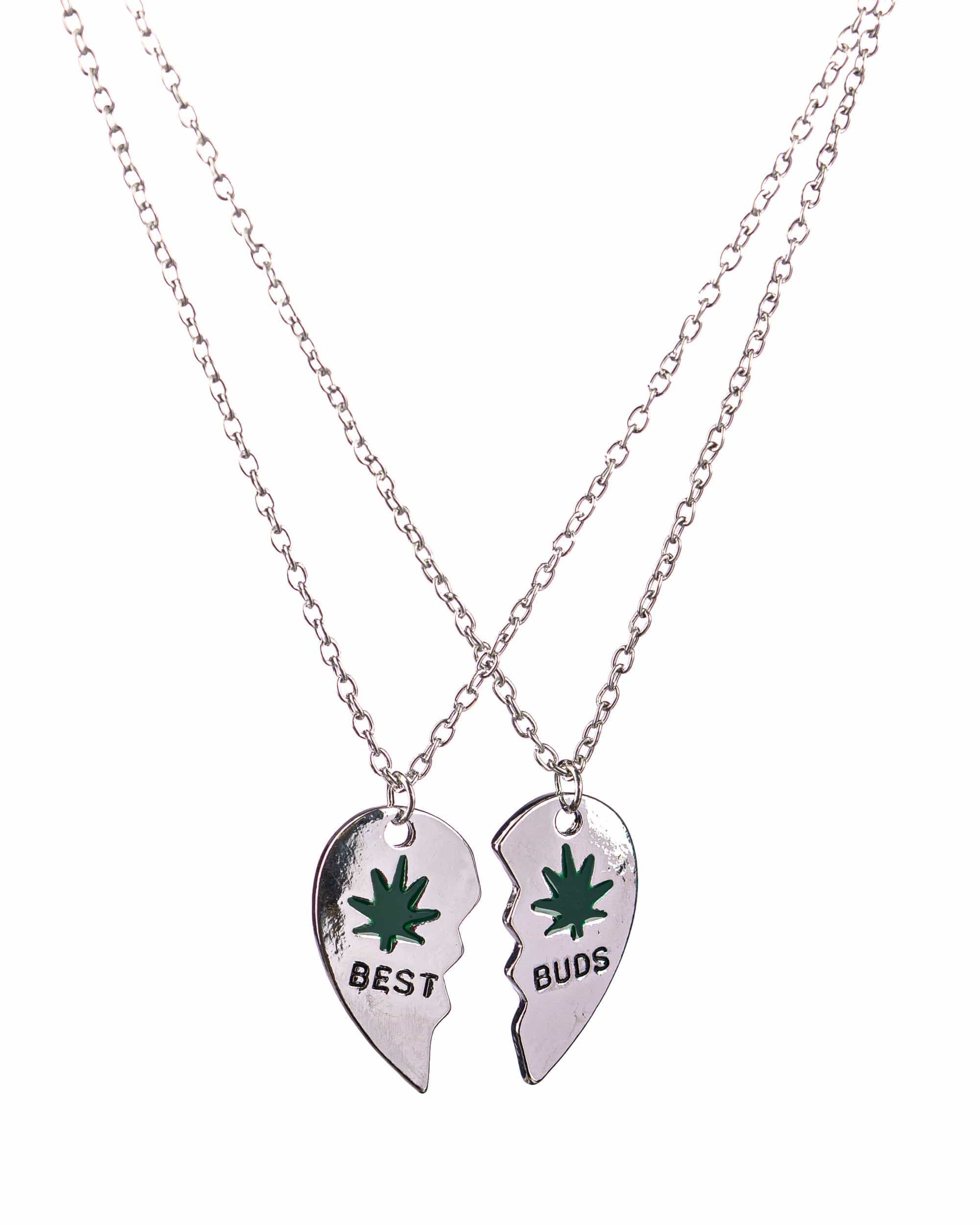 Overhead view of the Best Buds Sharable Necklace, showing two delicate silver chains with pendants designed to connect. Overhead view of the Best Buds Sharable Necklace, showing two delicate silver chains with pendants designed to connect.