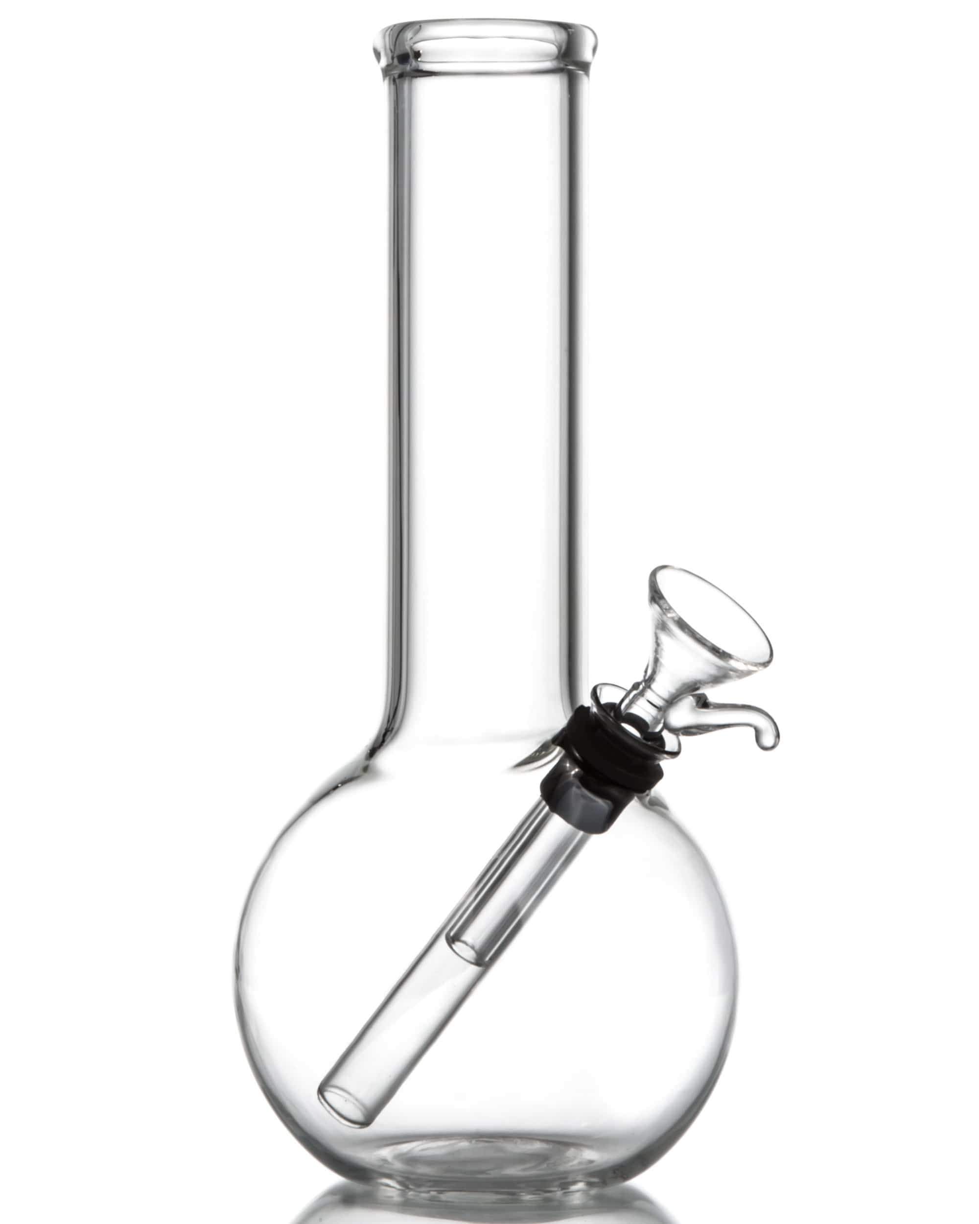 A three-quarter view of the Clear Glass Basic Water Pipe, showcasing its clear glass construction and simple cylindrical shape. A three-quarter view of the Clear Glass Basic Water Pipe, showcasing its clear glass construction and simple cylindrical shape.