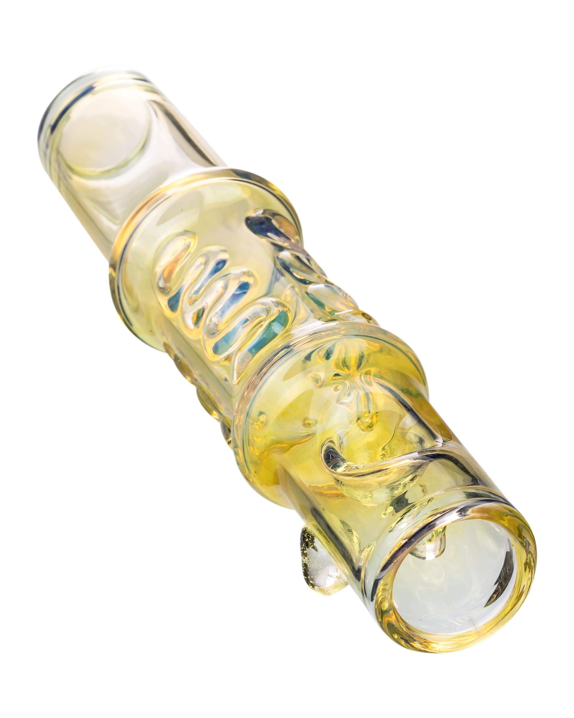 A close-up, angled view of the Fumed 8" Palm Steamroller, showcasing the transparent glass and subtle fume pattern. A close-up, angled view of the Fumed 8" Palm Steamroller, showcasing the transparent glass and subtle fume pattern.