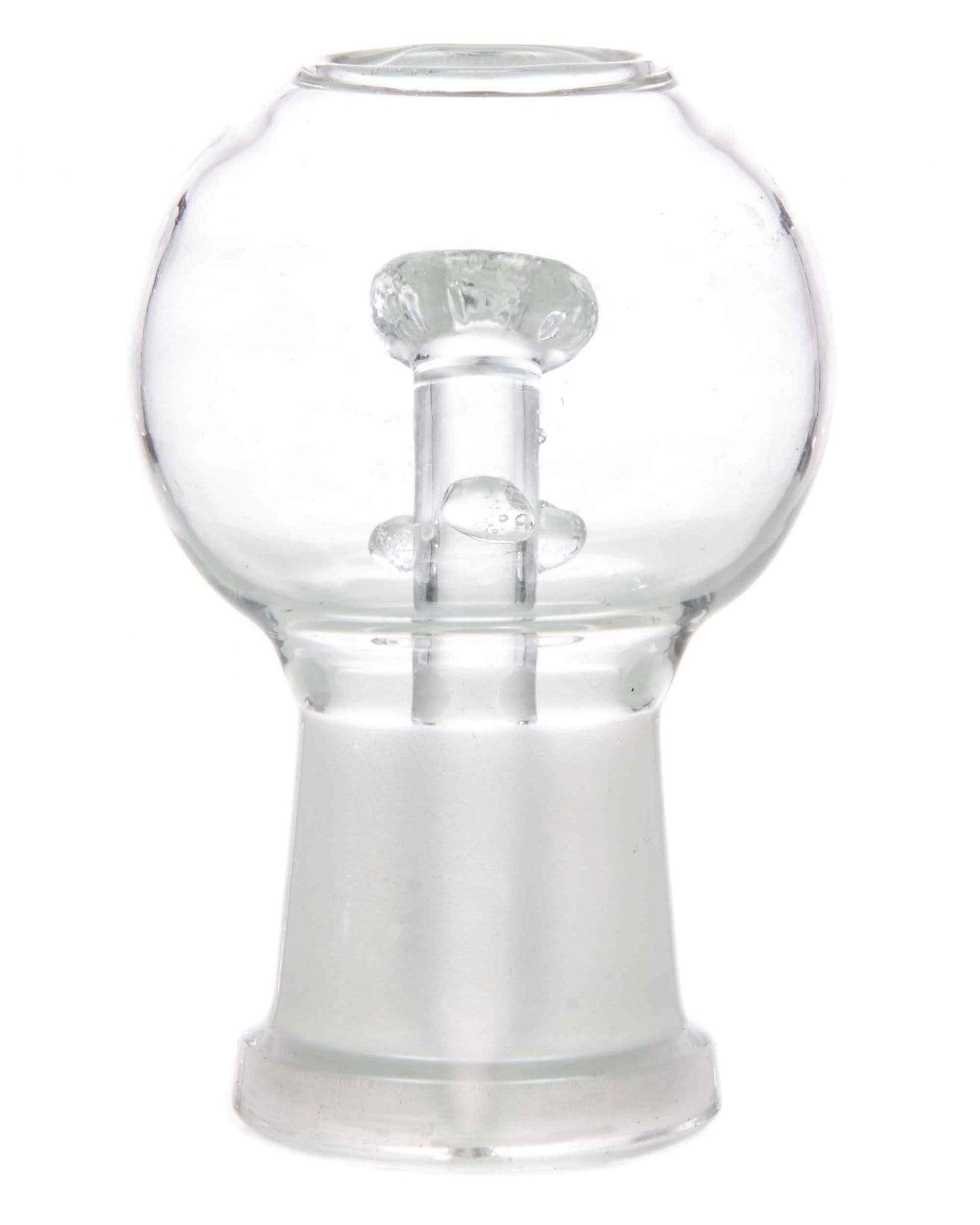 Front view of the Glass Dome and Nail, a clear glass dome resting above a small, cylindrical nail. Front view of the Glass Dome and Nail, a clear glass dome resting above a small, cylindrical nail.