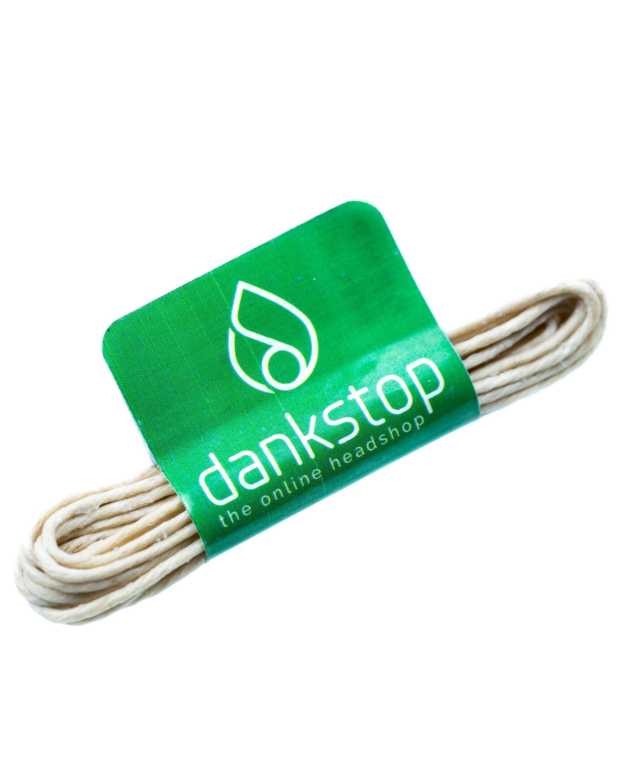 A close-up of the Hemp Wick 5ft (3 pack) coiled on a white background, highlighting its natural fiber texture. A close-up of the Hemp Wick 5ft (3 pack) coiled on a white background, highlighting its natural fiber texture.