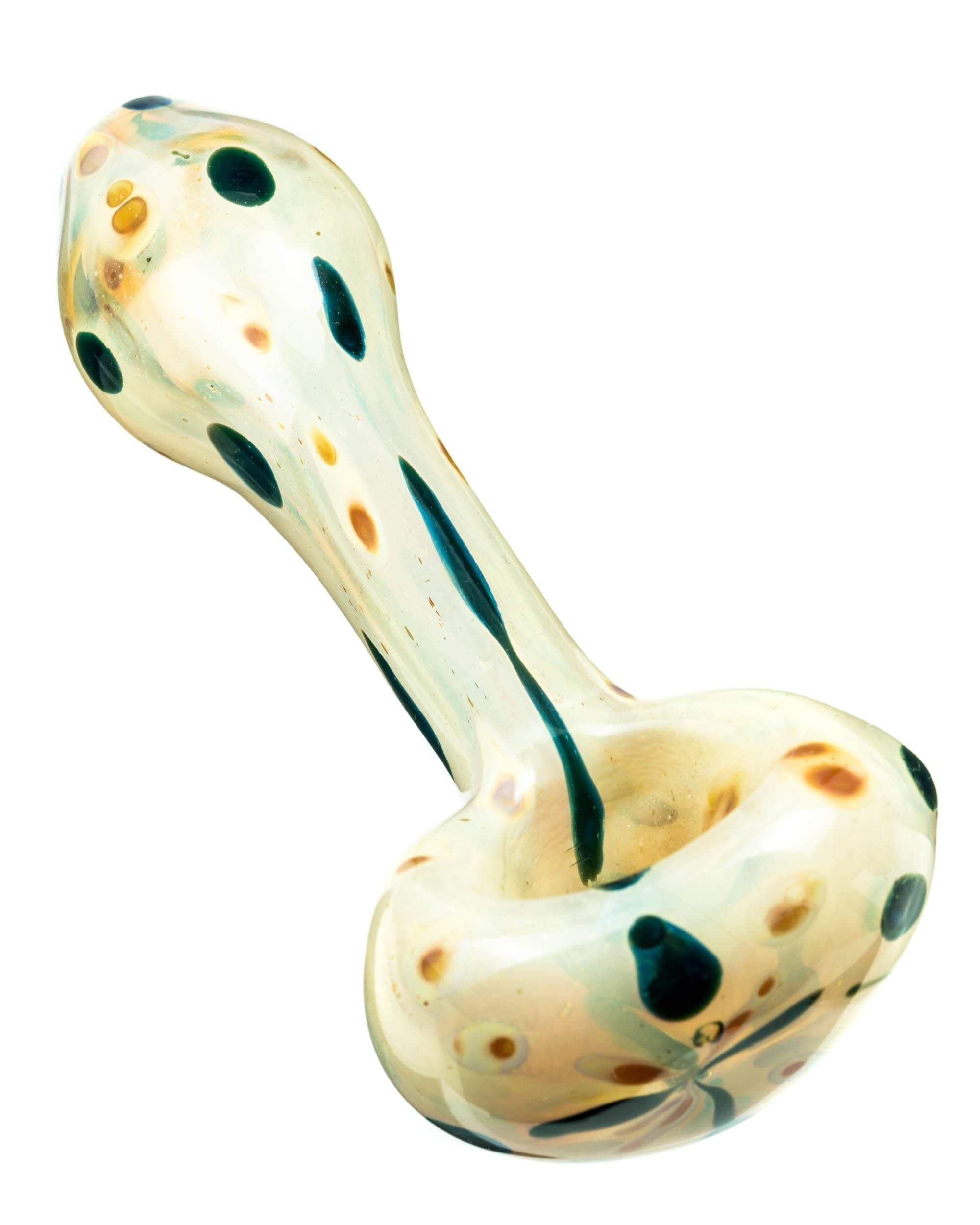 A slightly angled view of the Milky Spotted Spoon Pipe, showcasing its speckled pattern and curved form against a plain background. A slightly angled view of the Milky Spotted Spoon Pipe, showcasing its speckled pattern and curved form against a plain background.