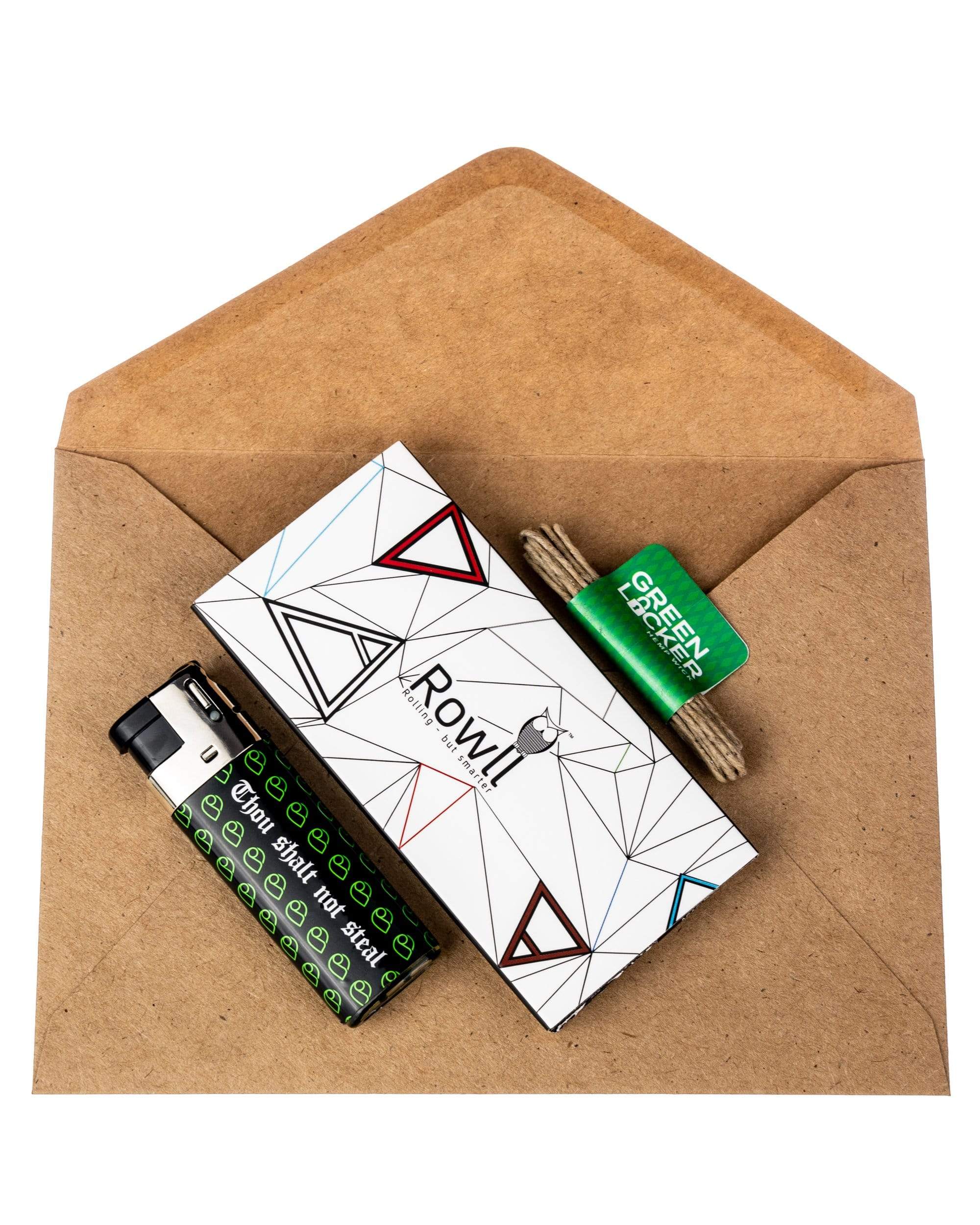 A top-down view of the Monthly Smoker Essentials Pack, showcasing the branded packaging with a clean, minimalist design. A top-down view of the Monthly Smoker Essentials Pack, showcasing the branded packaging with a clean, minimalist design.