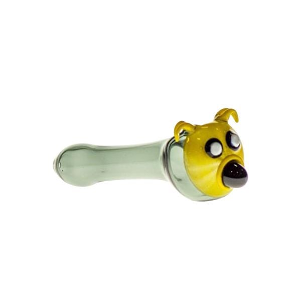 A side view of the Yellow Dog Spoon Pipe, showing the sculpted yellow dog head and curved bowl. A side view of the Yellow Dog Spoon Pipe, showing the sculpted yellow dog head and curved bowl.