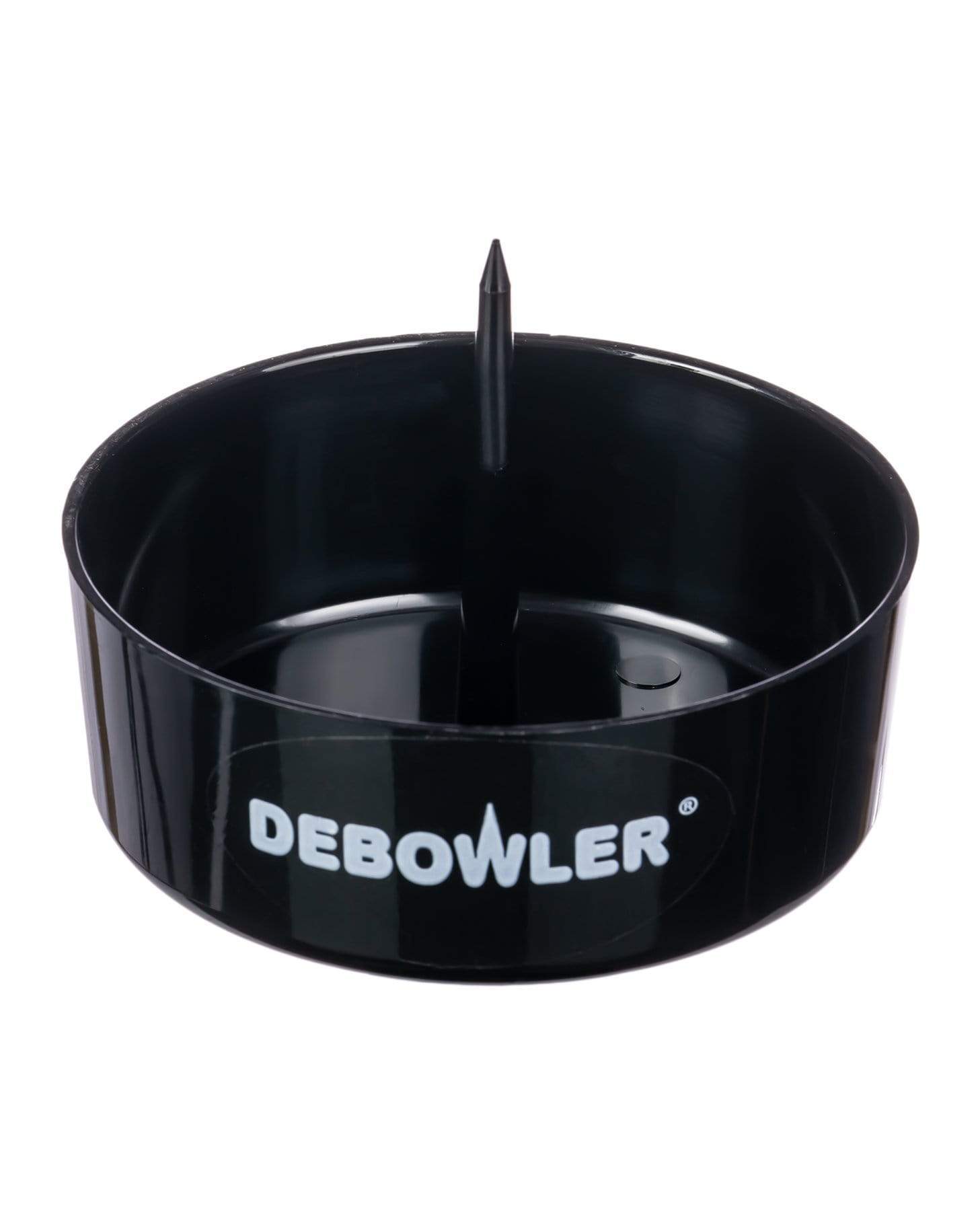 A straight-on view of the Debowler, a dark-colored, bowl-shaped device against a plain white background. A straight-on view of the Debowler, a dark-colored, bowl-shaped device against a plain white background.