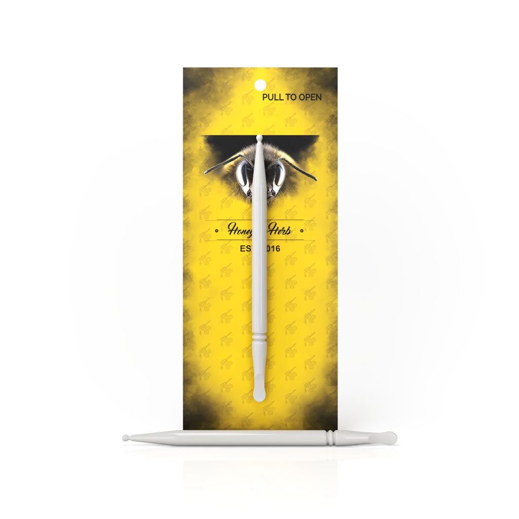 Front view of the Original Ceramic Dab Tool, displaying a white ceramic tip against a dark background. Front view of the Original Ceramic Dab Tool, displaying a white ceramic tip against a dark background.