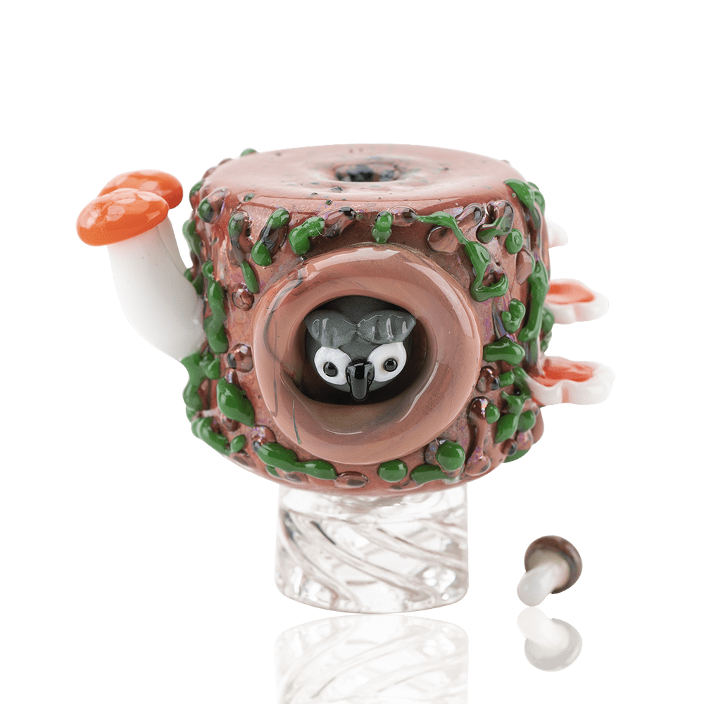 A close-up, angled view of Hootie's Forest Spinner Cap, showcasing a whimsical, textured design resembling a miniature forest scene. A close-up, angled view of Hootie's Forest Spinner Cap, showcasing a whimsical, textured design resembling a miniature forest scene.