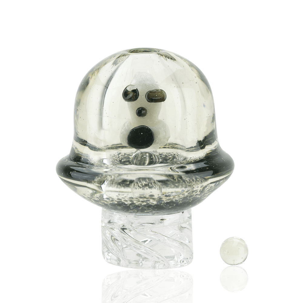 A slightly angled view of the UV Illuminati Martian Spinner Cap, showing its clear glass construction and reflective surface. A slightly angled view of the UV Illuminati Martian Spinner Cap, showing its clear glass construction and reflective surface.