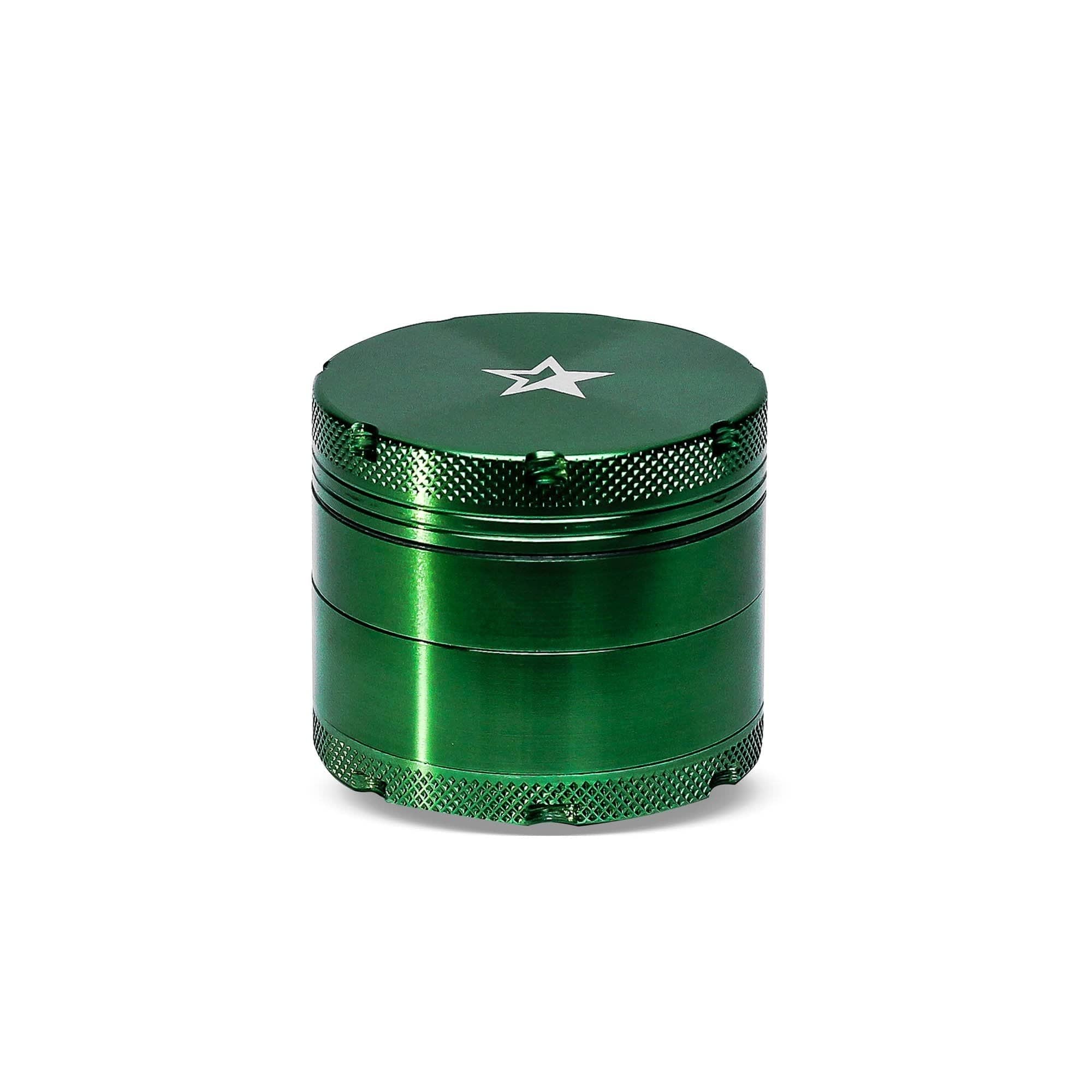 Front view of the Famous X 50mm 4-Piece Aluminum Grinder, a silver, multi-tiered cylindrical device with a textured surface. Front view of the Famous X 50mm 4-Piece Aluminum Grinder, a silver, multi-tiered cylindrical device with a textured surface.