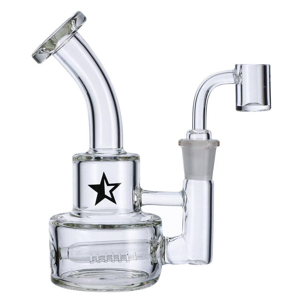 Front view of the Famous X 6" Stack Dab Rig, showcasing the clear glass construction and compact stack design. Front view of the Famous X 6" Stack Dab Rig, showcasing the clear glass construction and compact stack design.