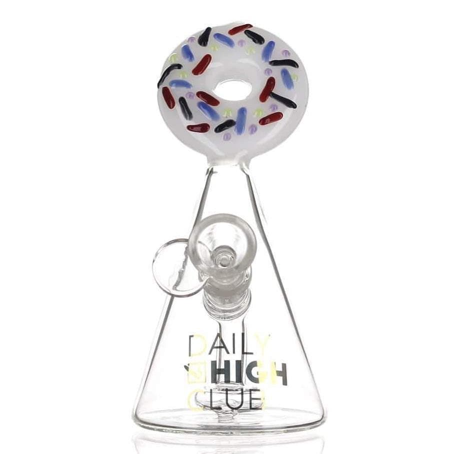 The Frosted Donut Bong is displayed in a close-up, angled shot, highlighting its colorful, frosted donut-shaped water chamber. The Frosted Donut Bong is displayed in a close-up, angled shot, highlighting its colorful, frosted donut-shaped water chamber.