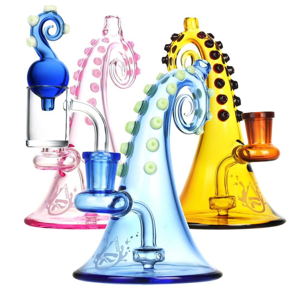 Front view of the Octopus Mini Dab Rig with Carb Cap, showcasing the colorful, sculpted glass piece against a plain white background. Front view of the Octopus Mini Dab Rig with Carb Cap, showcasing the colorful, sculpted glass piece against a plain white background.