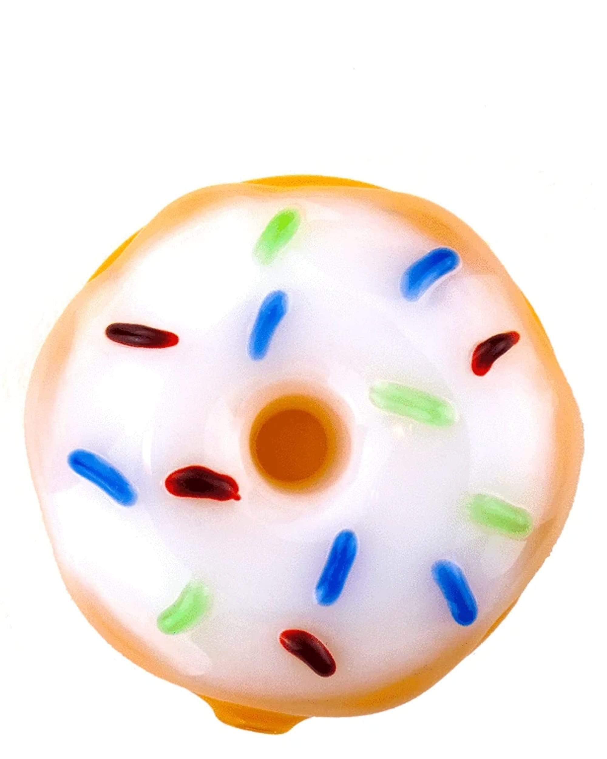 Front view of the Donut Hand Pipe, a glazed ceramic piece resembling a colorful donut. Front view of the Donut Hand Pipe, a glazed ceramic piece resembling a colorful donut.