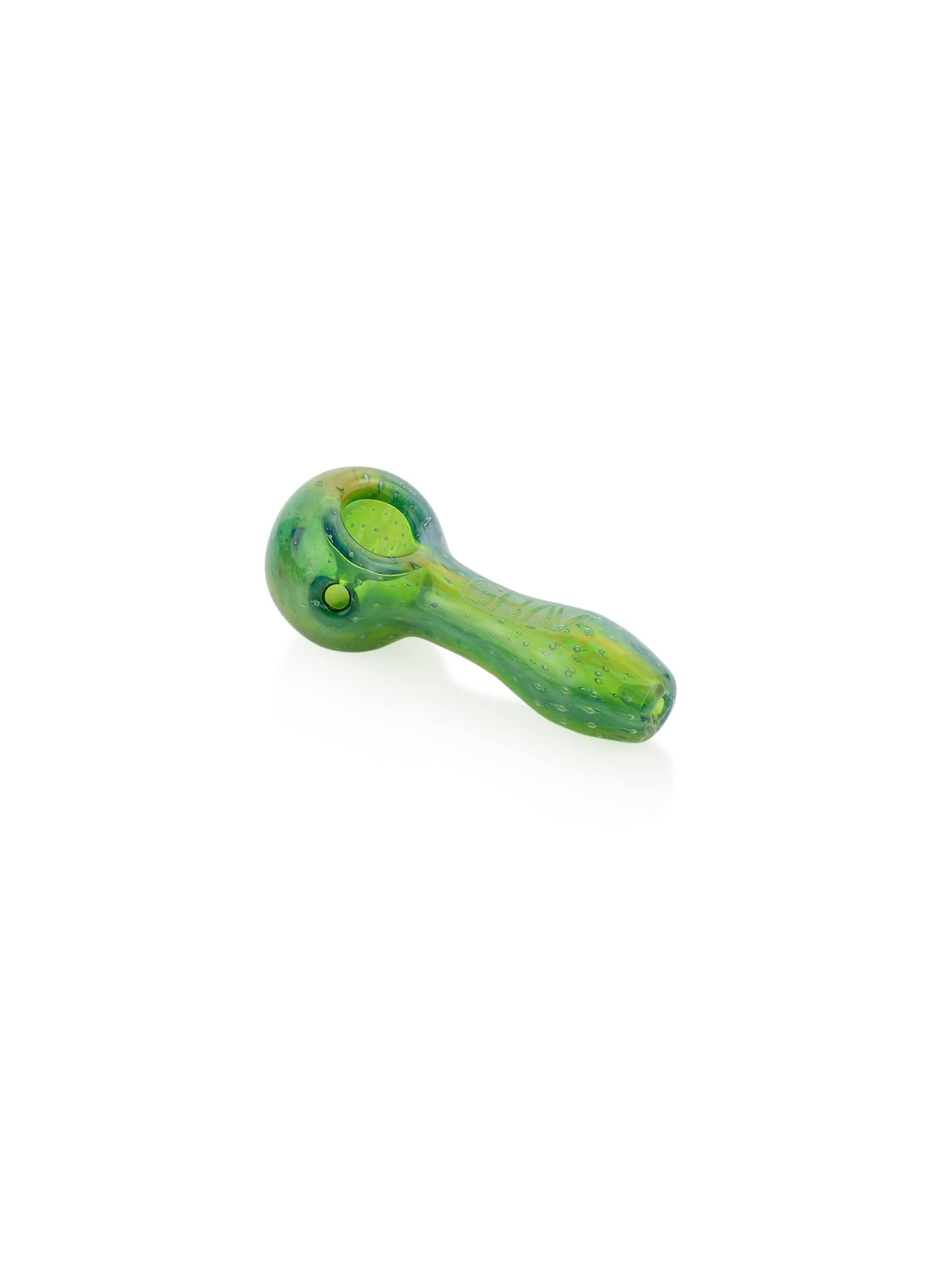 A side view of the Bubble Trap Spoon Pipe, showcasing its curved shape and smooth, translucent glass. A side view of the Bubble Trap Spoon Pipe, showcasing its curved shape and smooth, translucent glass.