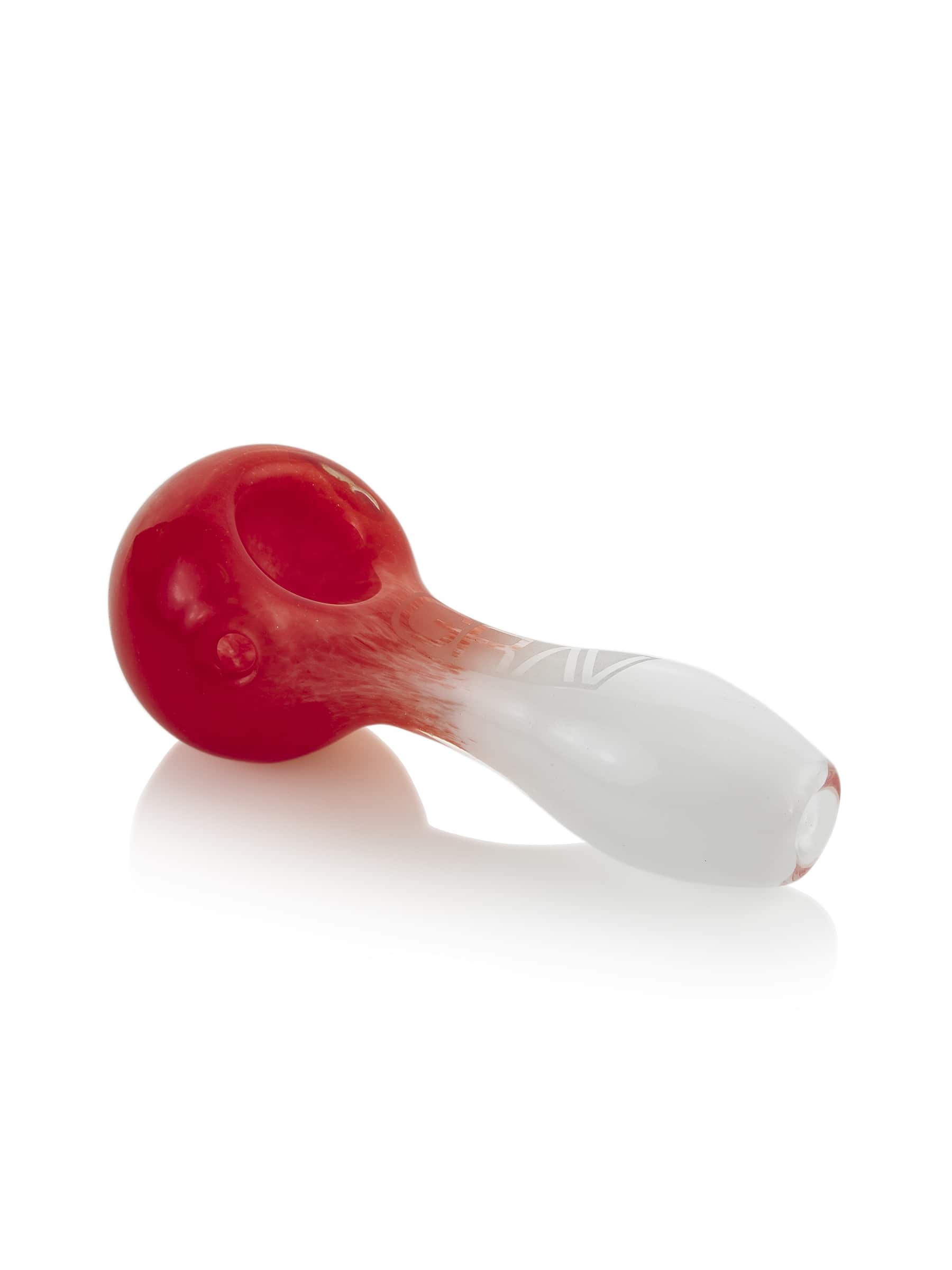 A product shot of the Frit Spoon, displaying its curved form and glossy finish against a plain white surface. A product shot of the Frit Spoon, displaying its curved form and glossy finish against a plain white surface.