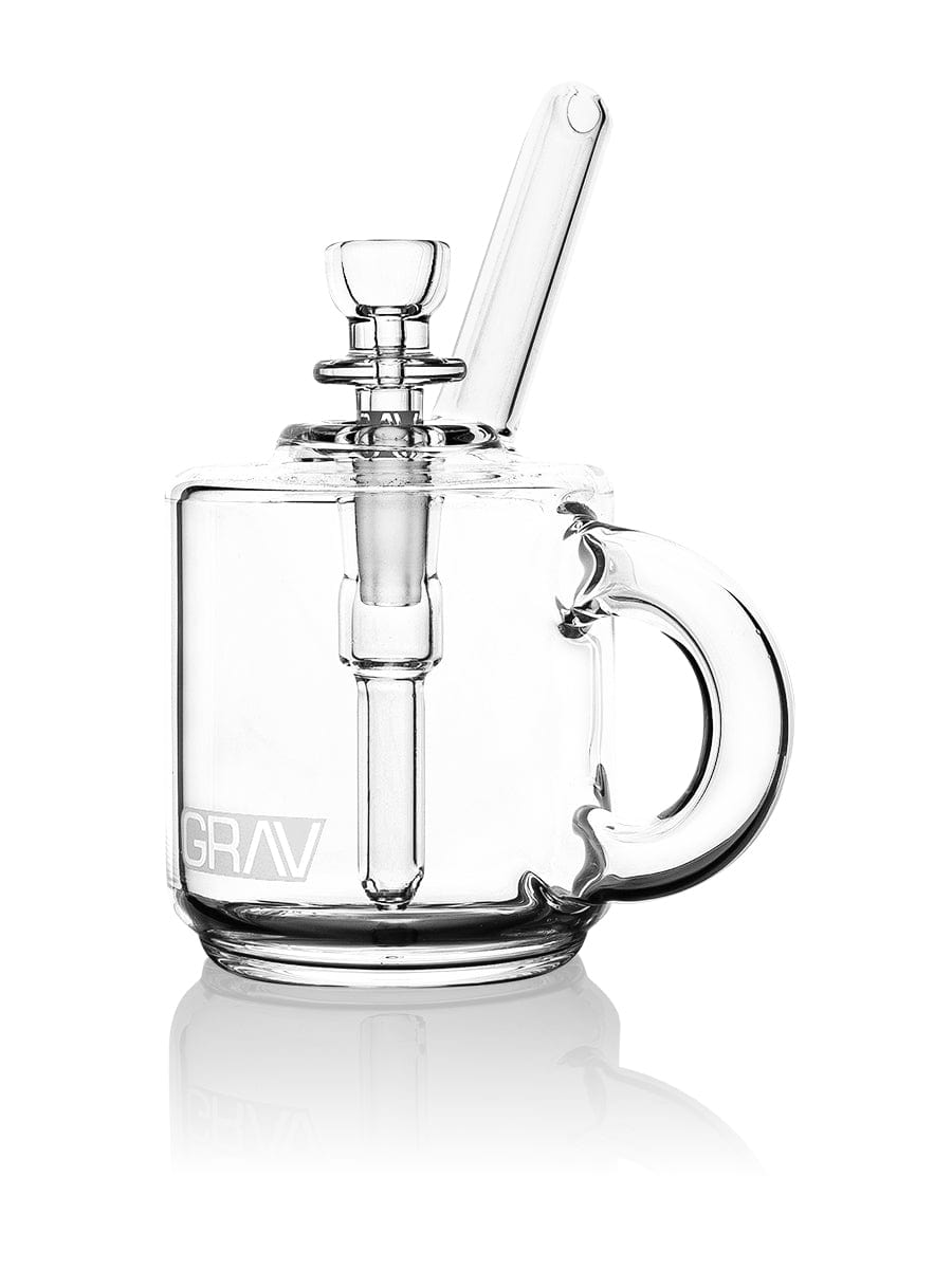A side view of the GRAV Coffee Mug Pocket Bubbler, showcasing its clear glass construction and compact, mug-like shape. A side view of the GRAV Coffee Mug Pocket Bubbler, showcasing its clear glass construction and compact, mug-like shape.