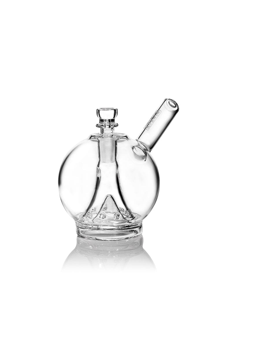 A front view of the Globe Bubbler, showcasing its clear glass construction and rounded shape reflected on a glossy surface. A front view of the Globe Bubbler, showcasing its clear glass construction and rounded shape reflected on a glossy surface.