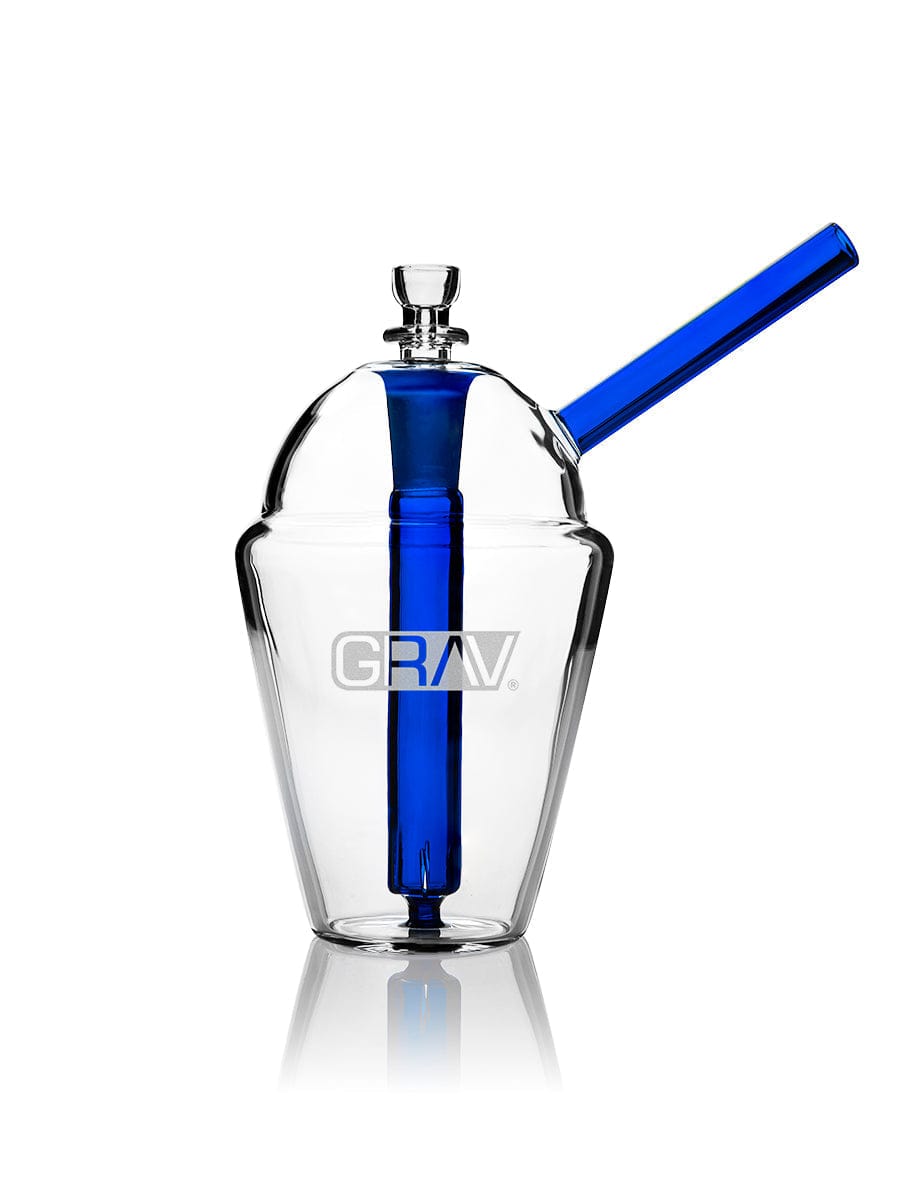 Front view of the Slush Cup Bong, a clear glass water pipe with a blue accent, reflecting on a glossy surface. Front view of the Slush Cup Bong, a clear glass water pipe with a blue accent, reflecting on a glossy surface.