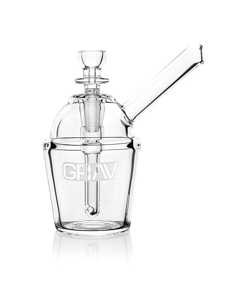 A three-quarter view of the Slush Cup Pocket Bubbler, showcasing its clear glass construction and compact size. A three-quarter view of the Slush Cup Pocket Bubbler, showcasing its clear glass construction and compact size.