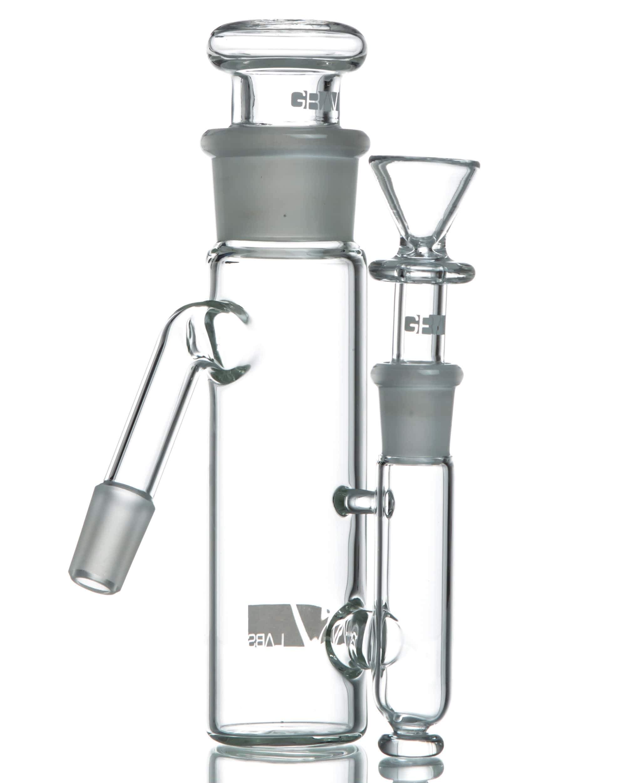 A side view of the 45˚ Joint "Phoenix" Ashcatcher with a removable top, showing its clear glass construction and angled joint. A side view of the 45˚ Joint "Phoenix" Ashcatcher with a removable top, showing its clear glass construction and angled joint.