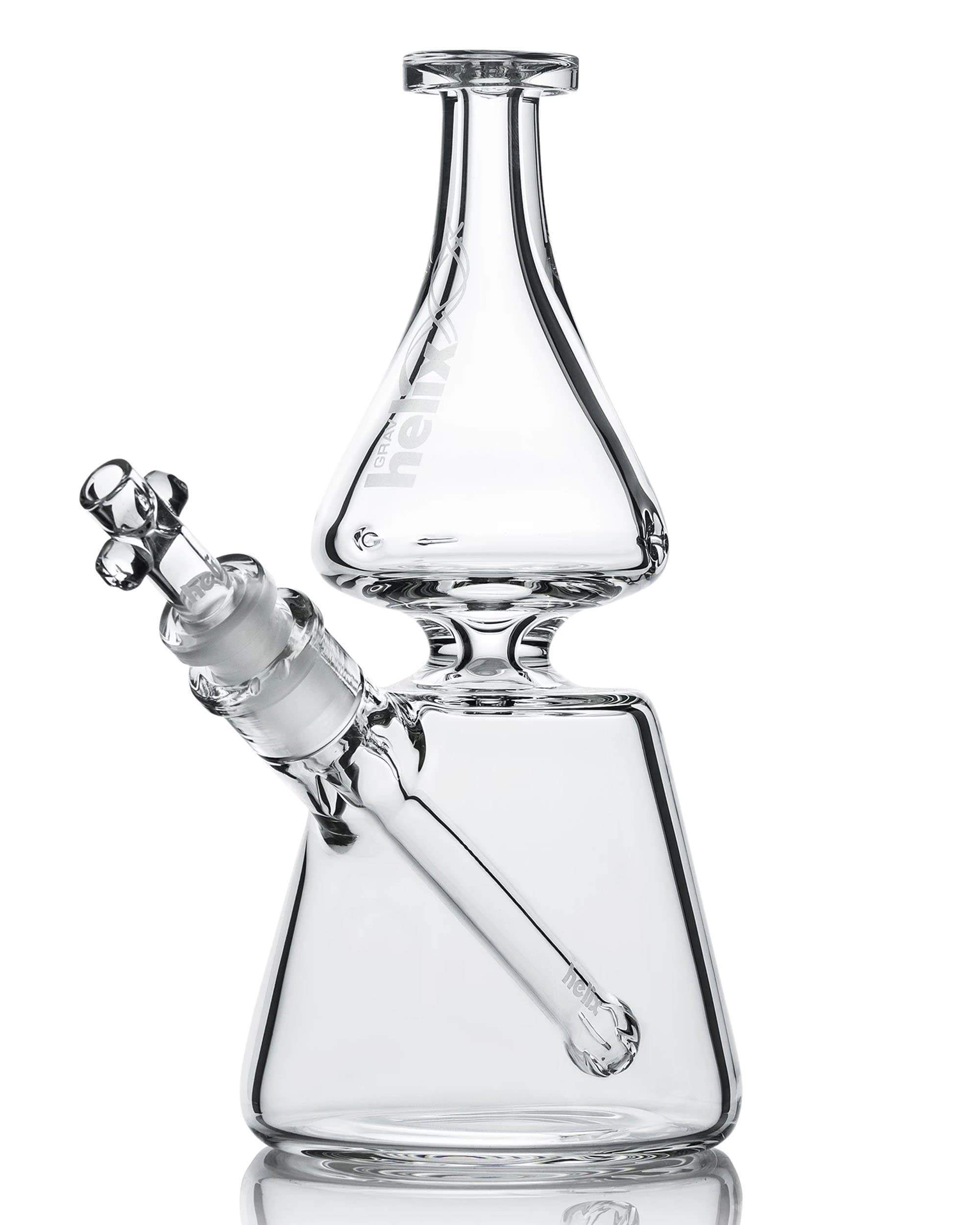 A front view of the Classic Helix Beaker Bongs, showcasing the clear glass construction and simple beaker shape. A front view of the Classic Helix Beaker Bongs, showcasing the clear glass construction and simple beaker shape.
