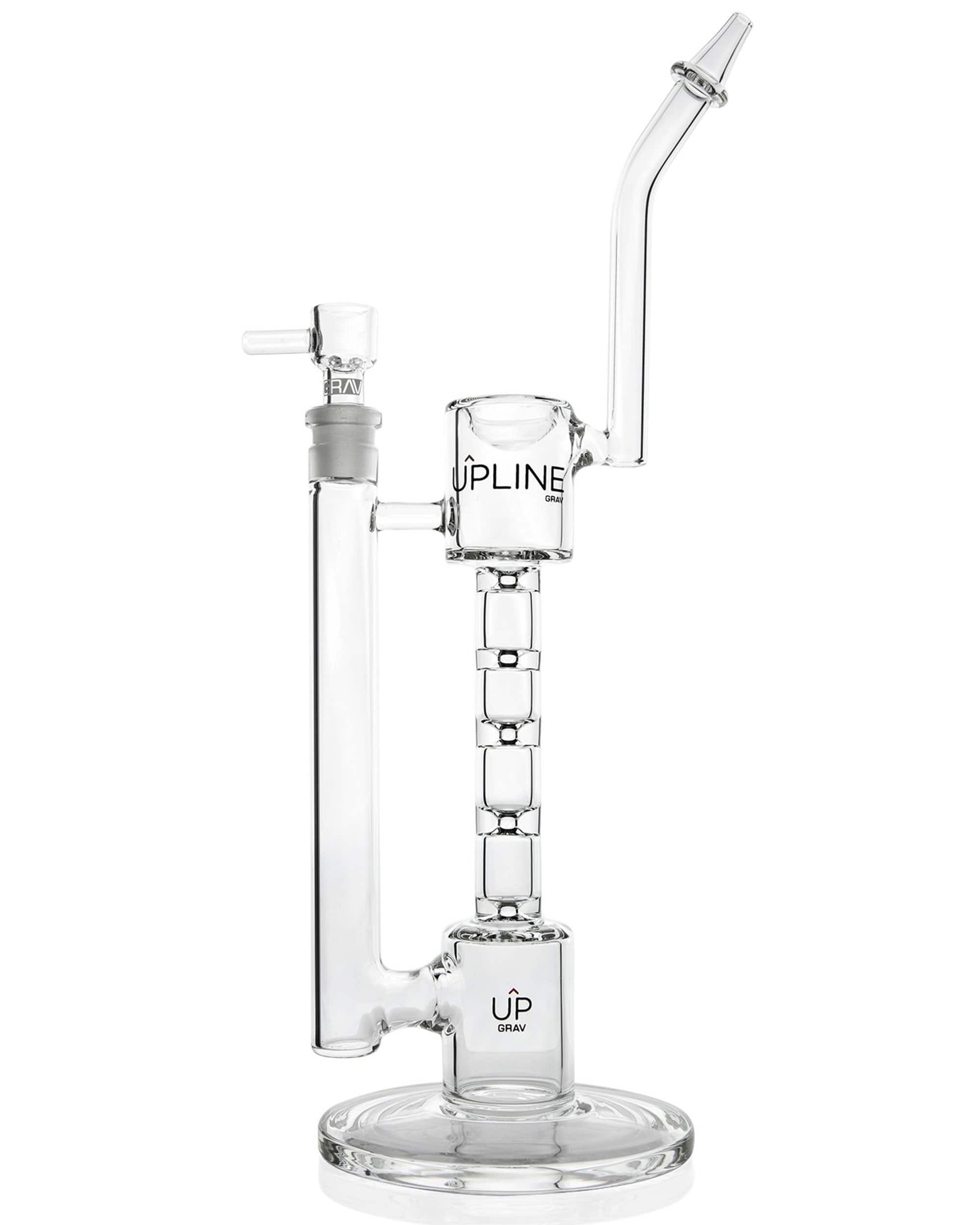 Front view of the O.G. Upline Water Pipe, a clear glass piece with a circular base and long, slender neck. Front view of the O.G. Upline Water Pipe, a clear glass piece with a circular base and long, slender neck.