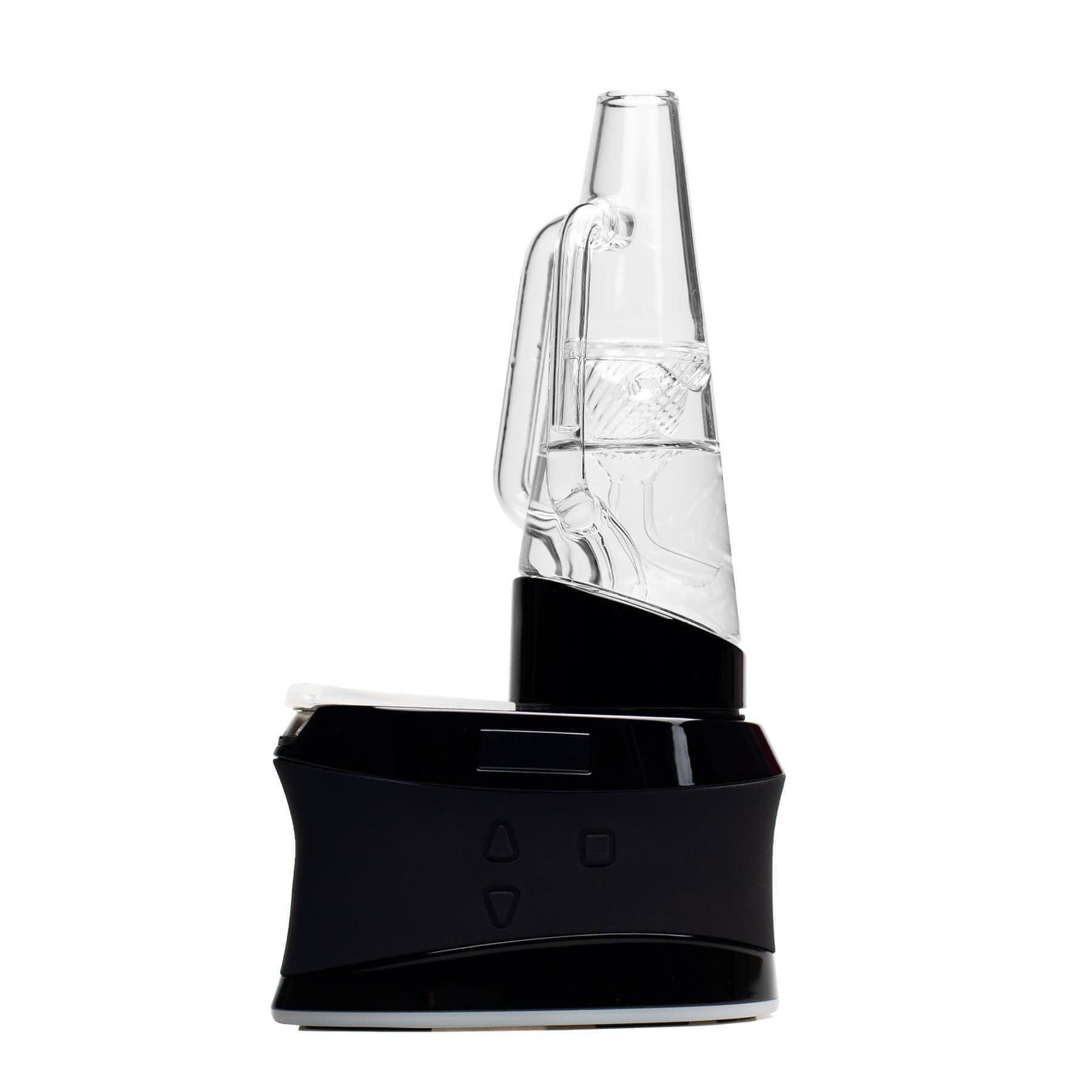 A close-up, angled view of the DUO Puffco Peak & Peak Pro Mouthpiece Adapter, showcasing its clear glass construction. A close-up, angled view of the DUO Puffco Peak & Peak Pro Mouthpiece Adapter, showcasing its clear glass construction.