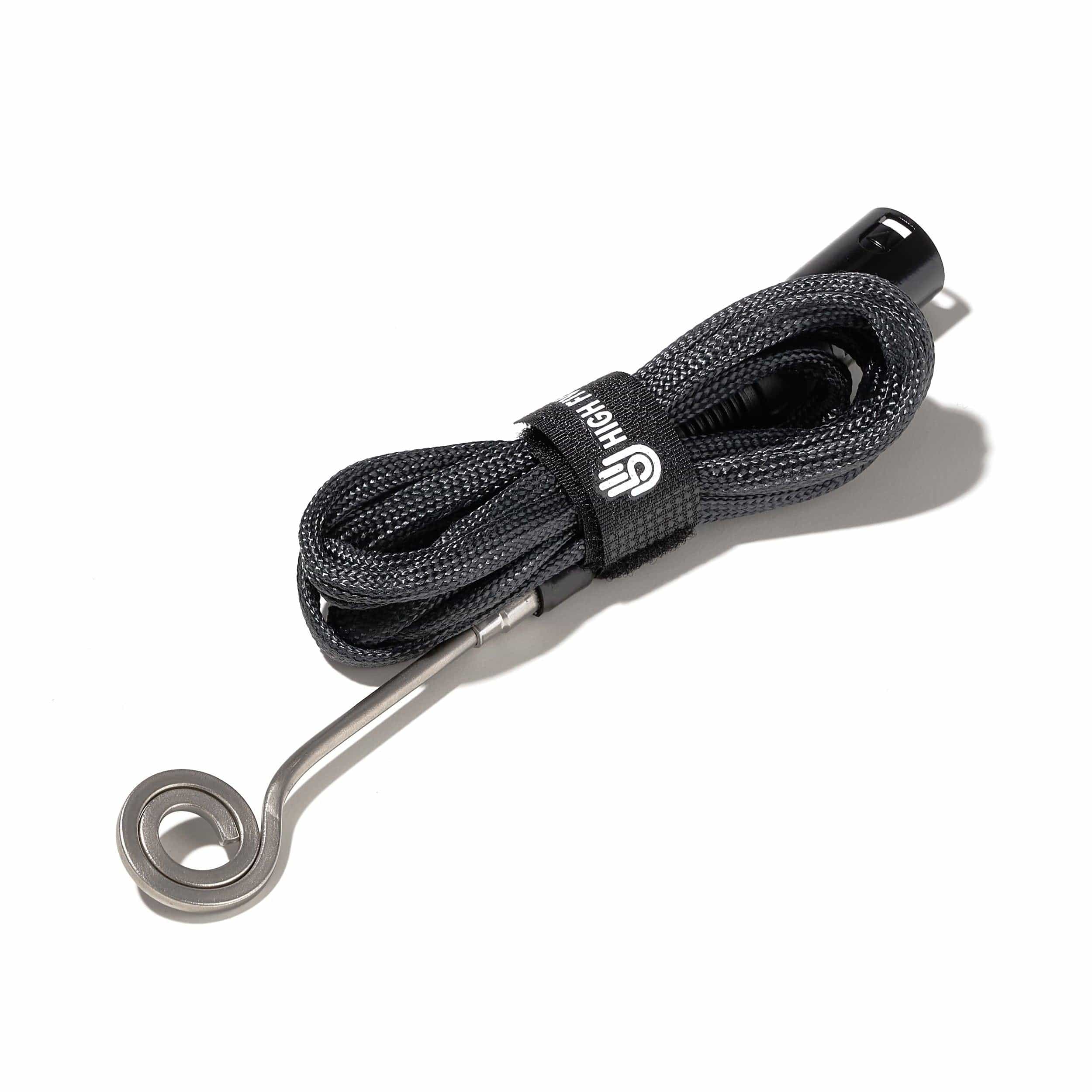 A close-up, angled view of the Flat E-Nail Coil, showcasing its metallic heating element and coiled design. A close-up, angled view of the Flat E-Nail Coil, showcasing its metallic heating element and coiled design.