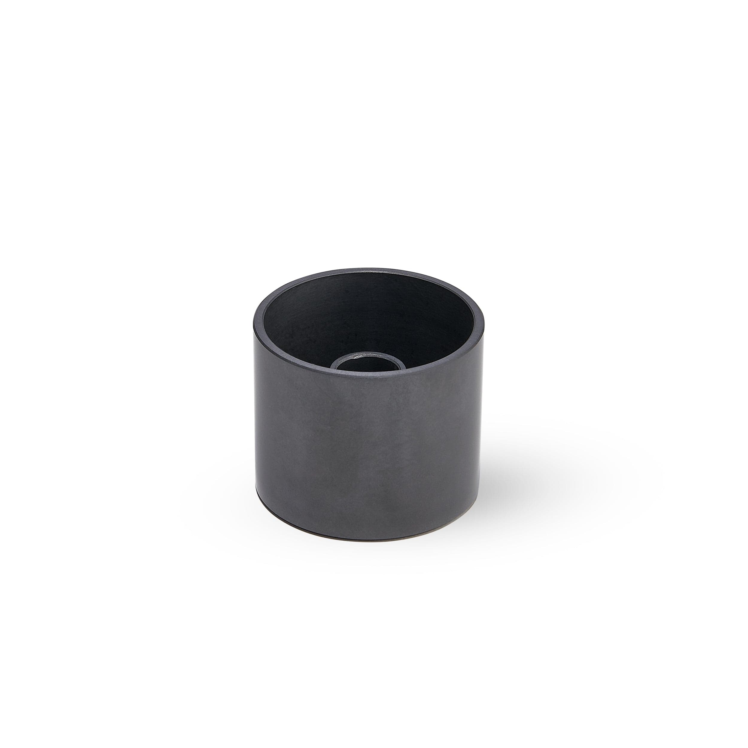 A top-down view of the SIC Hybrid Nail Dish, showcasing its dark, circular form against a neutral background. A top-down view of the SIC Hybrid Nail Dish, showcasing its dark, circular form against a neutral background.