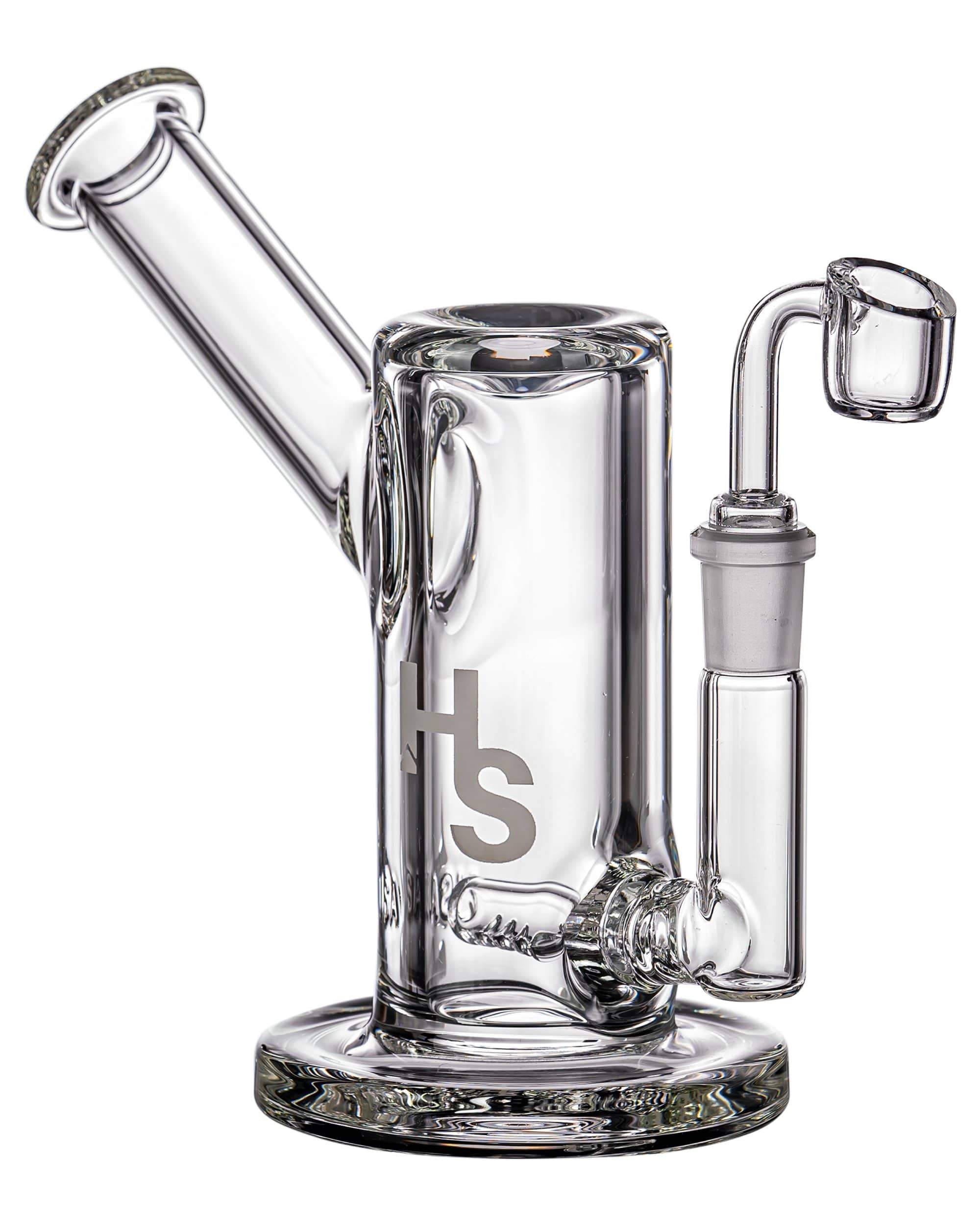 A studio shot of the Heavy Duty Rig Set, displaying a clear glass rig with a curved neck and joint visible in the center. A studio shot of the Heavy Duty Rig Set, displaying a clear glass rig with a curved neck and joint visible in the center.
