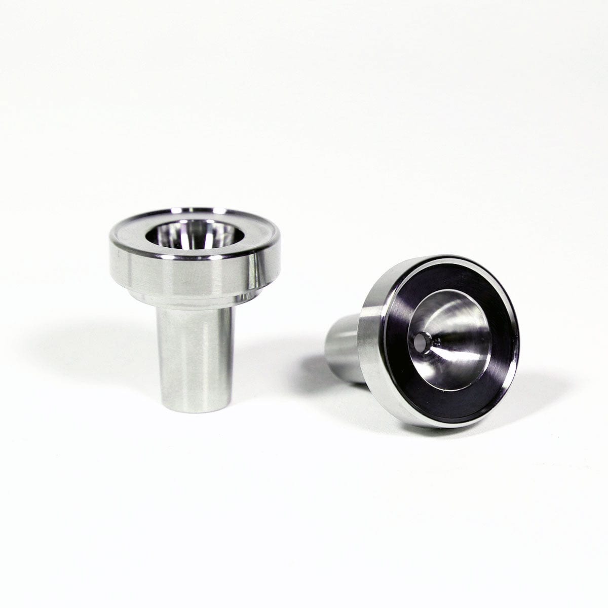 Close-up view of the Stainless Steel Bowl Piece, showcasing its polished metal finish and simple cylindrical shape. Close-up view of the Stainless Steel Bowl Piece, showcasing its polished metal finish and simple cylindrical shape.